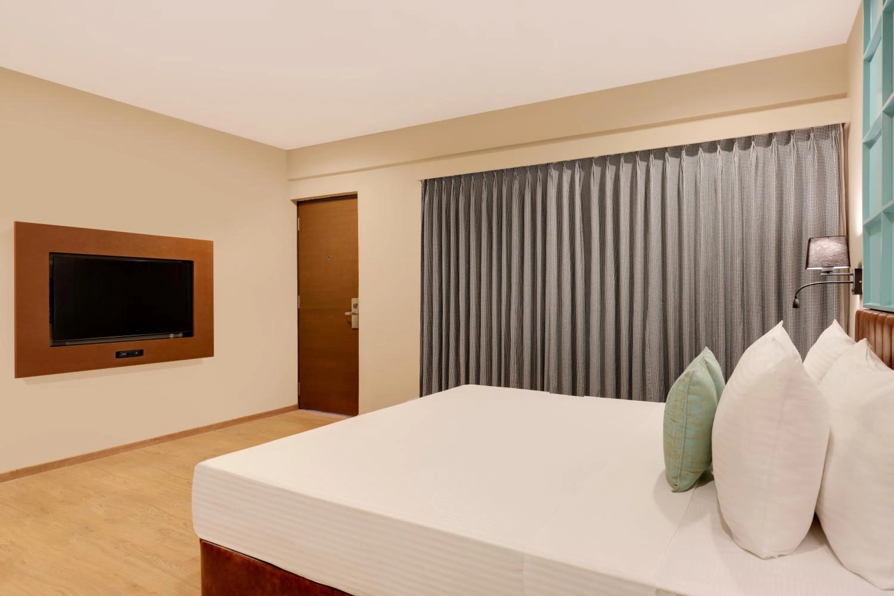 Bedroom, Bed in Lemon Tree Suites, Whitefield, Bengaluru