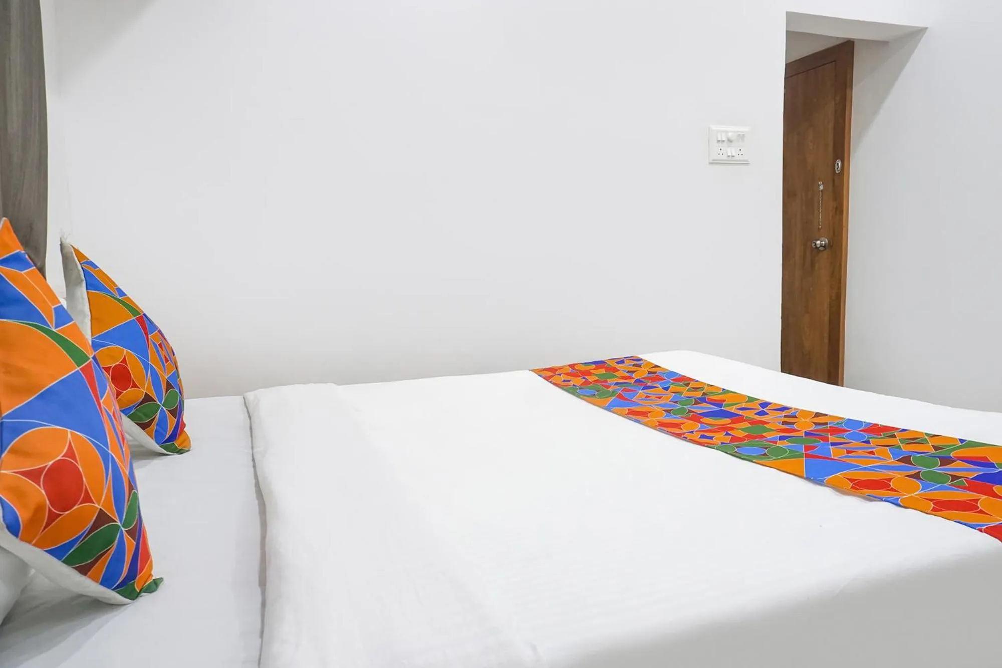 Bed in FabHotel The White House Inn