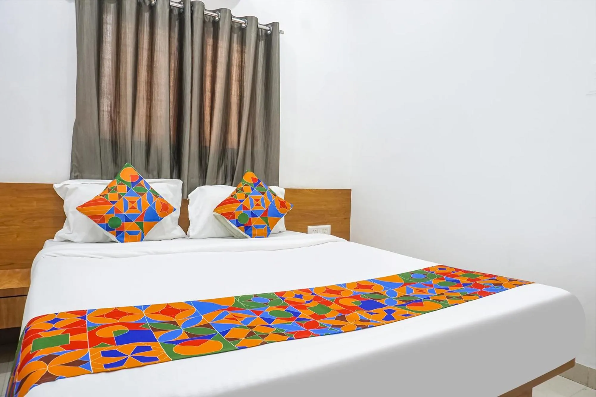 Bed in FabHotel The White House Inn