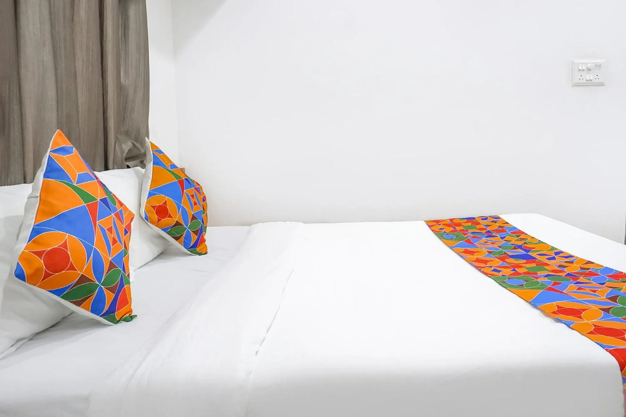 Bed in FabHotel The White House Inn