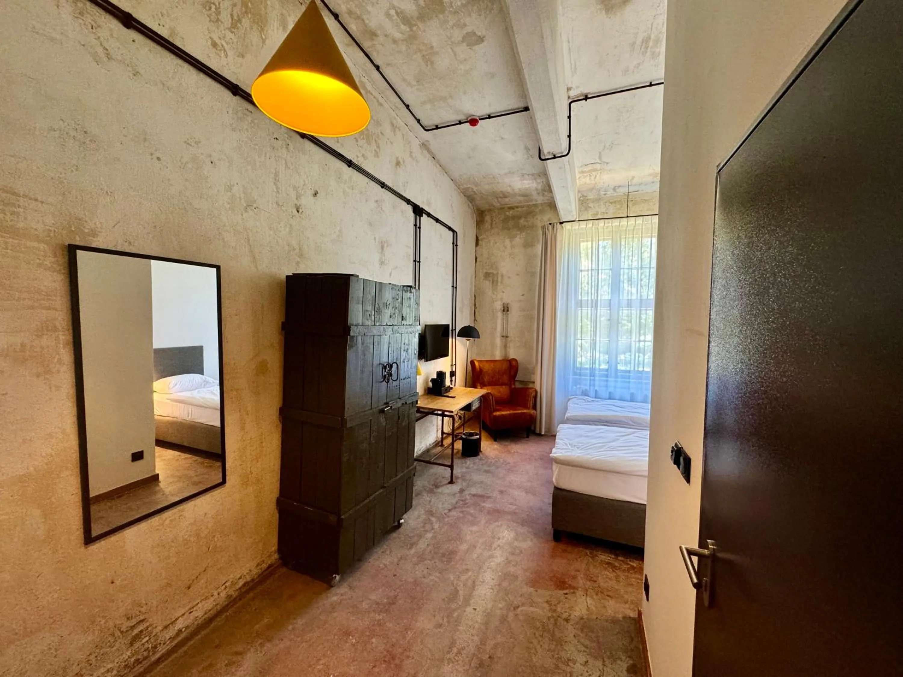 Bed in Hotel ARCHE Fabryka Samolotów w Mielnie