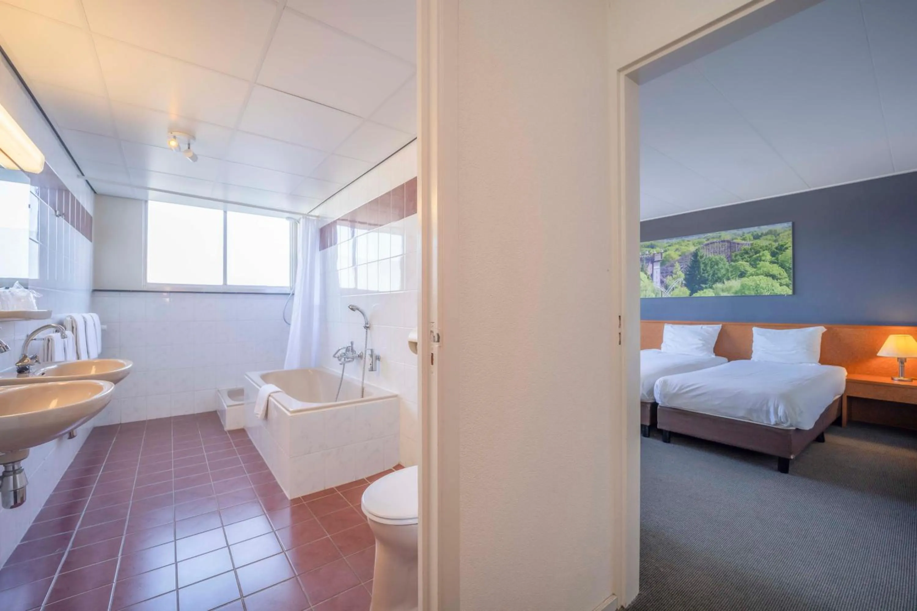 Bathroom, Bed in Fletcher Hotel-Restaurant Waalwijk