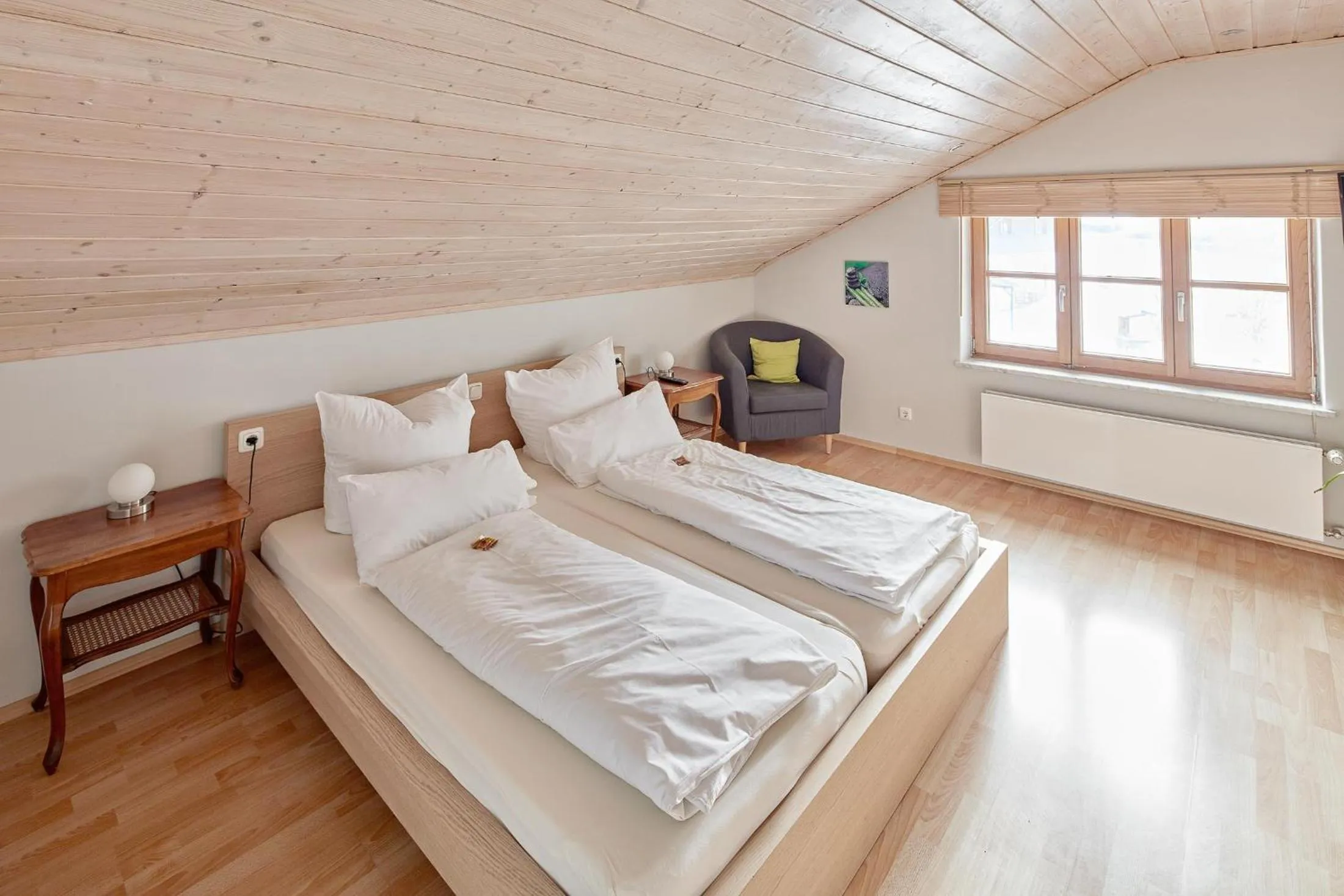 Photo of the whole room, Bed in Hotel Garni Alte Säge Ruhpolding inkl Chiemgaukarte