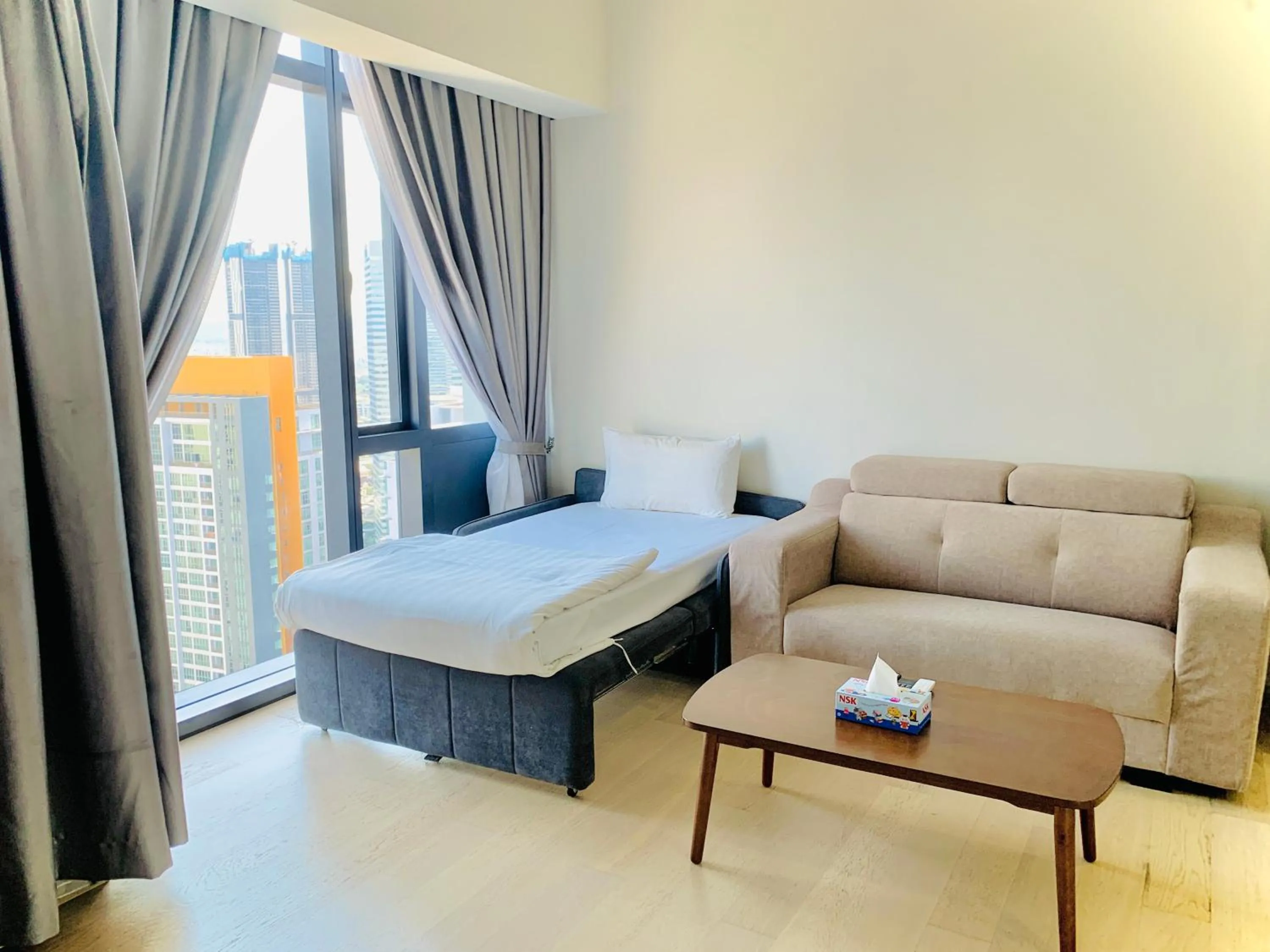 Living room, Bed in Star KLCC by Arman