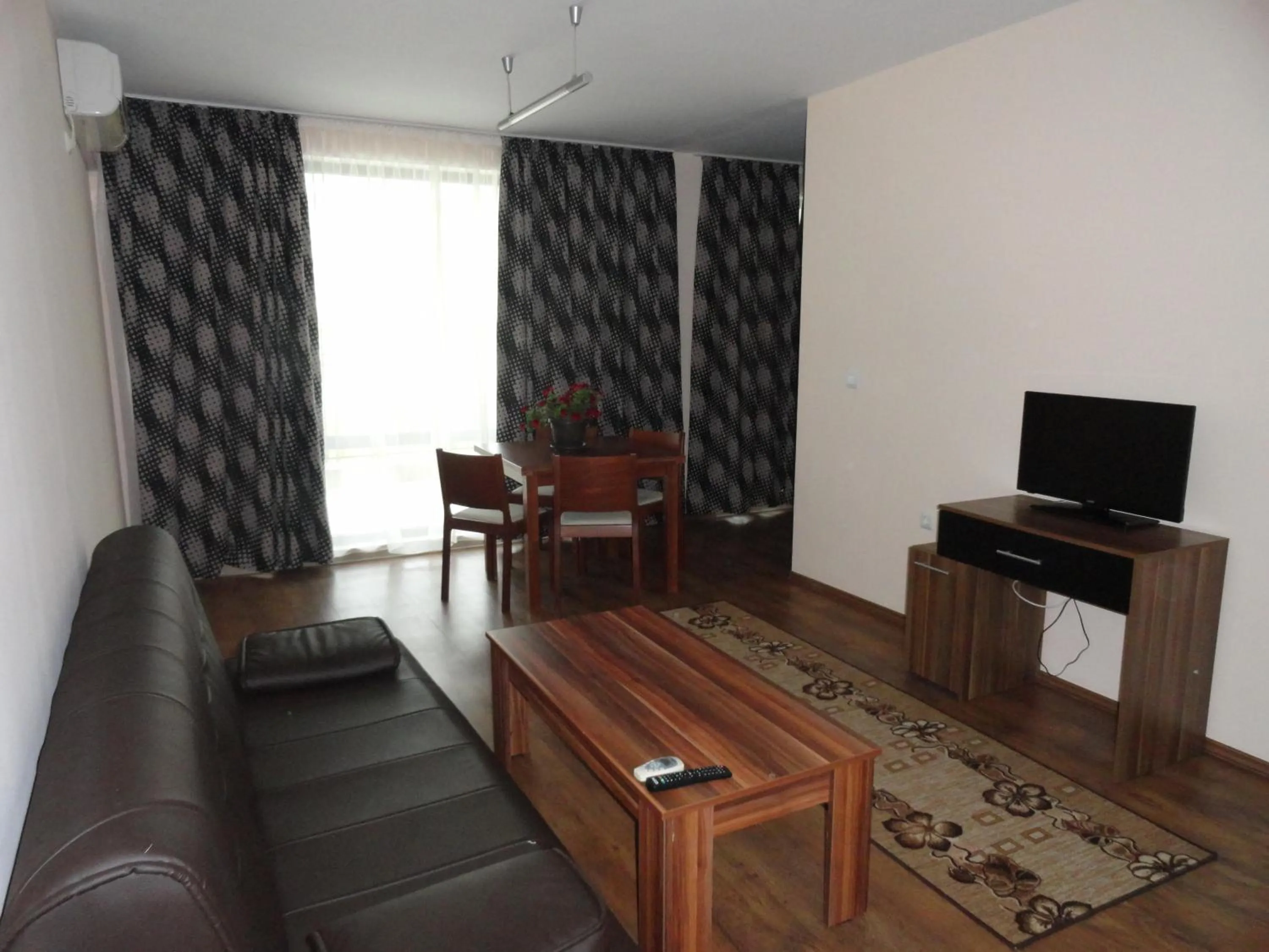 Living room in Cantilena Complex