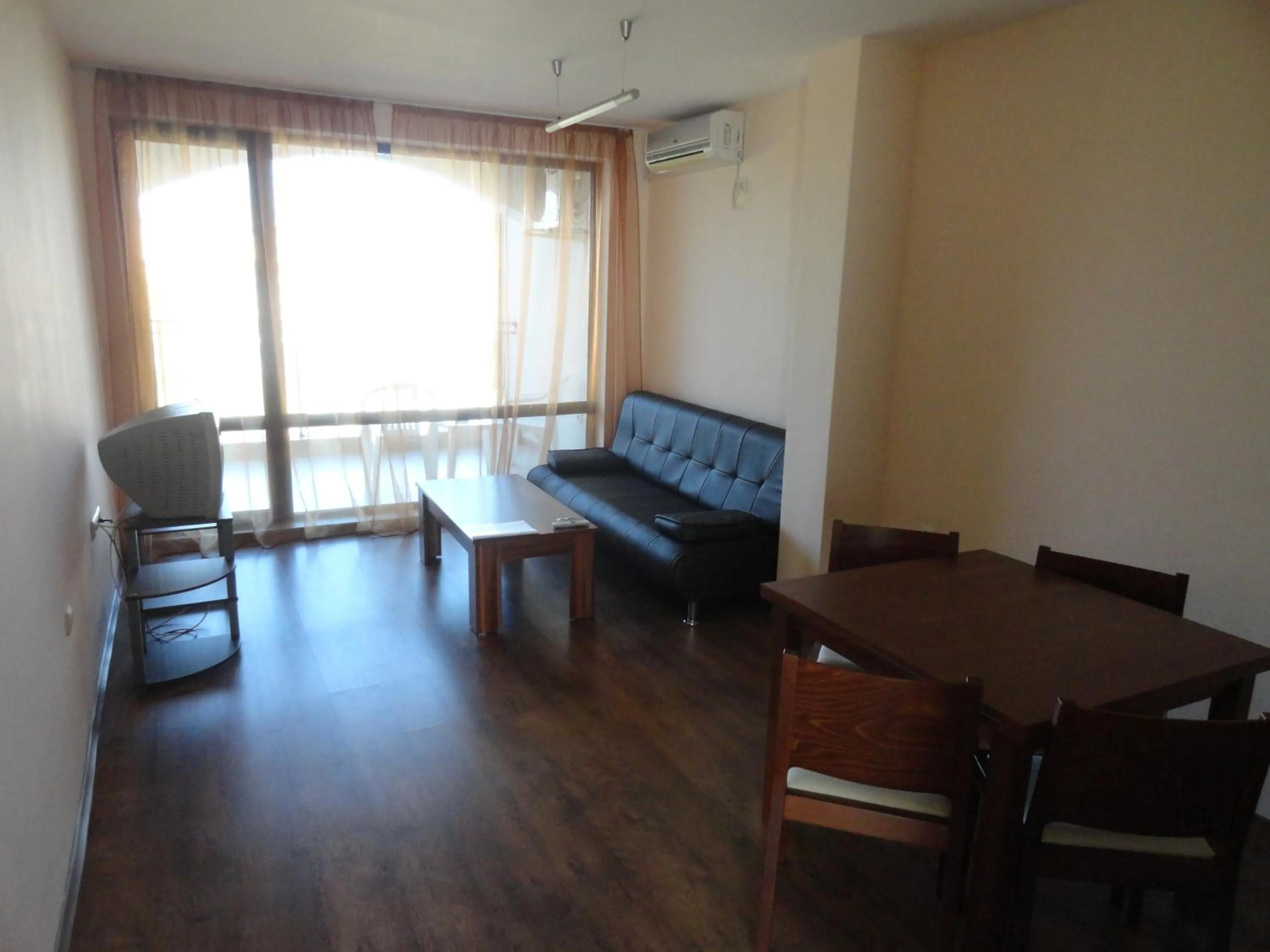 Living room in Cantilena Complex