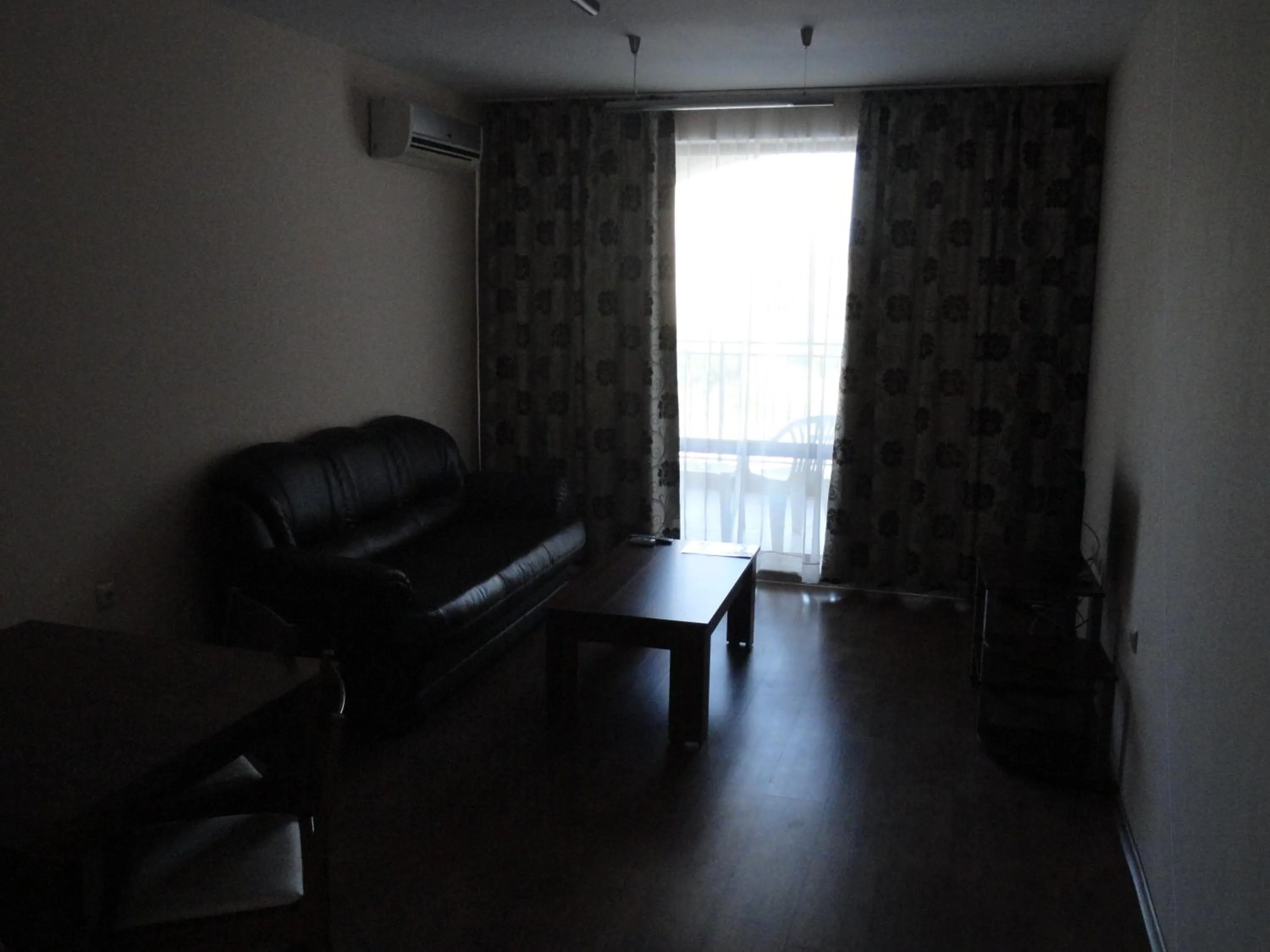 Living room in Cantilena Complex