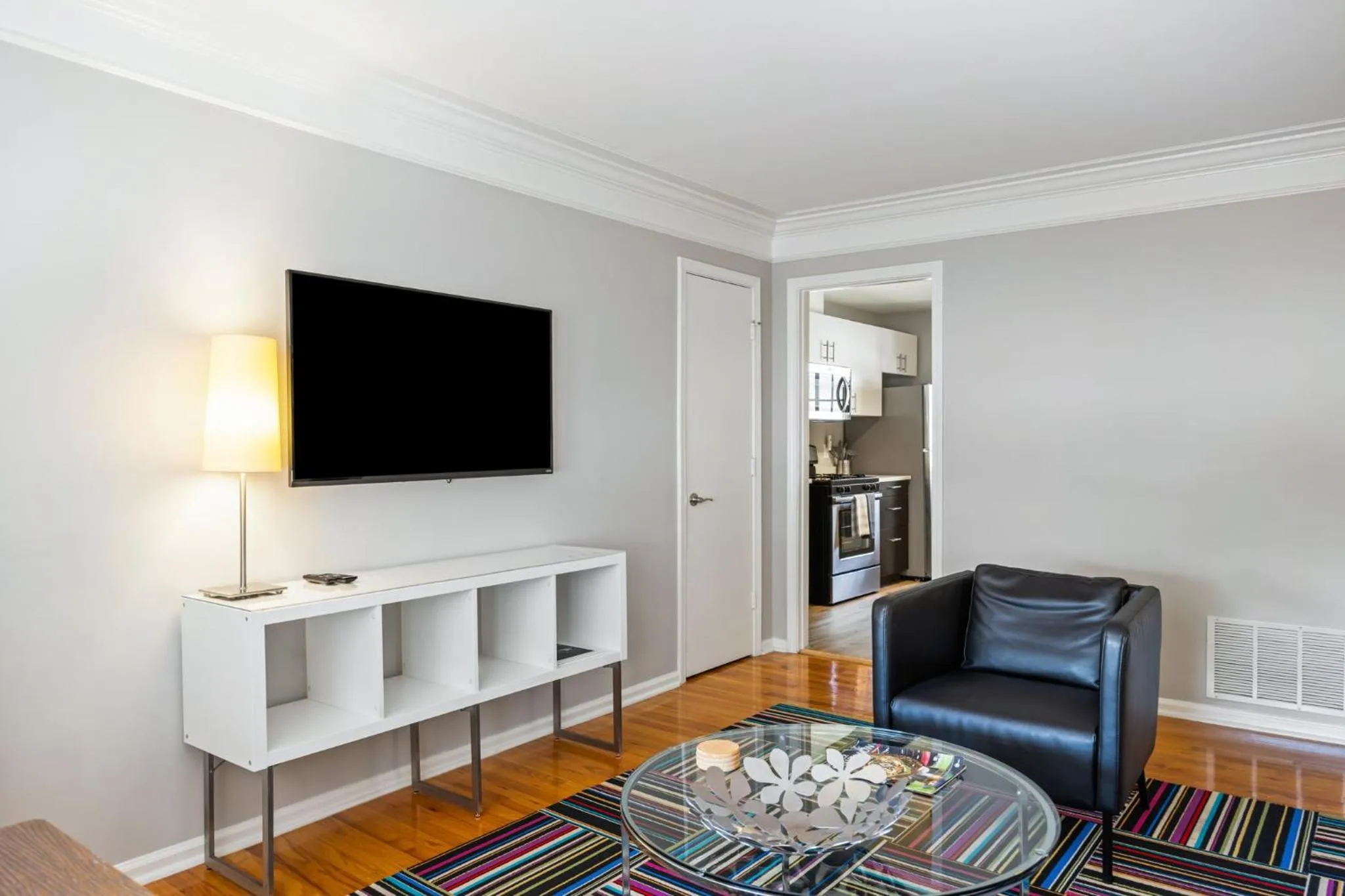 Communal lounge/ TV room in BCA Furnished Apartments