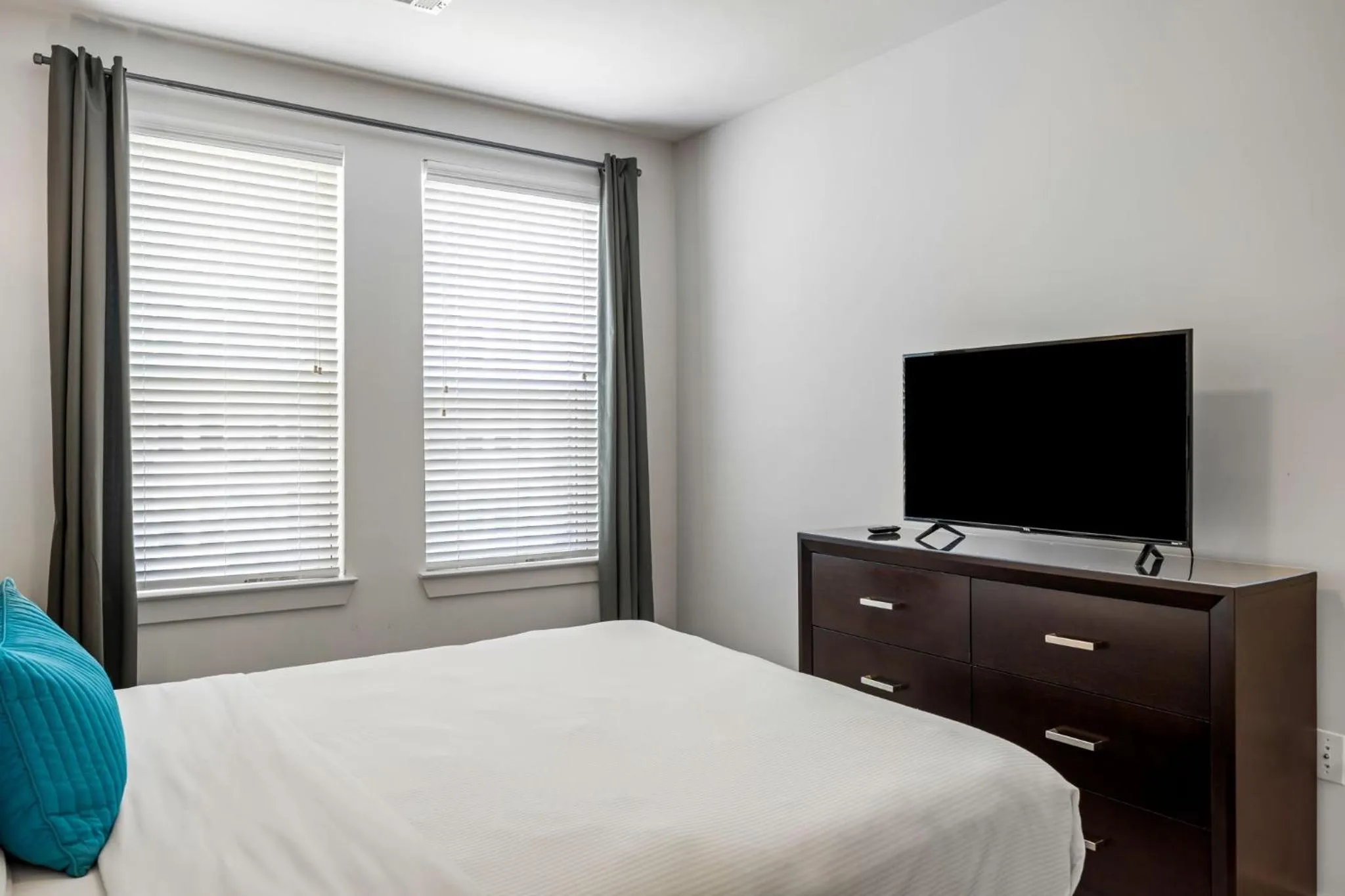 Bed in BCA Furnished Apartments