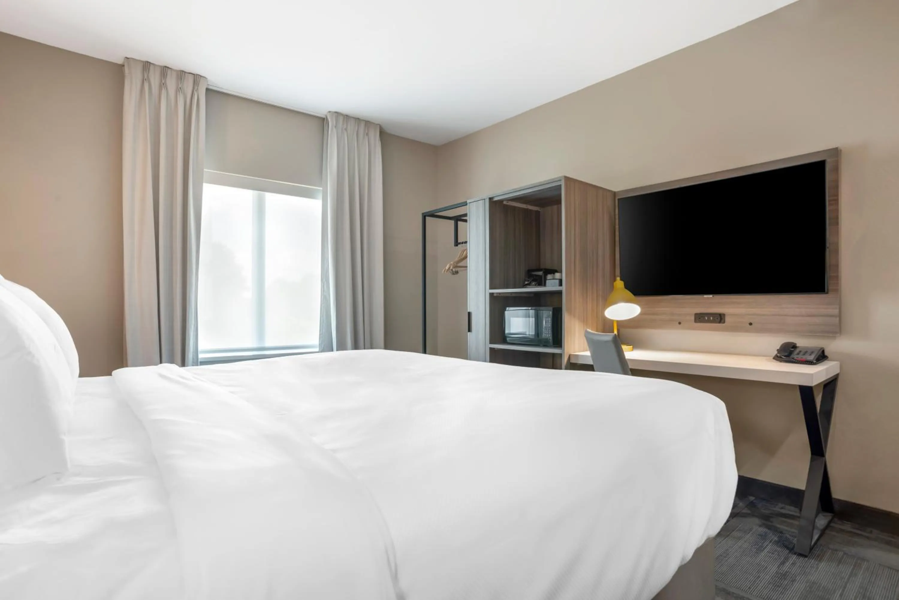 Bed in Comfort Inn & Suites Destin near Henderson Beach