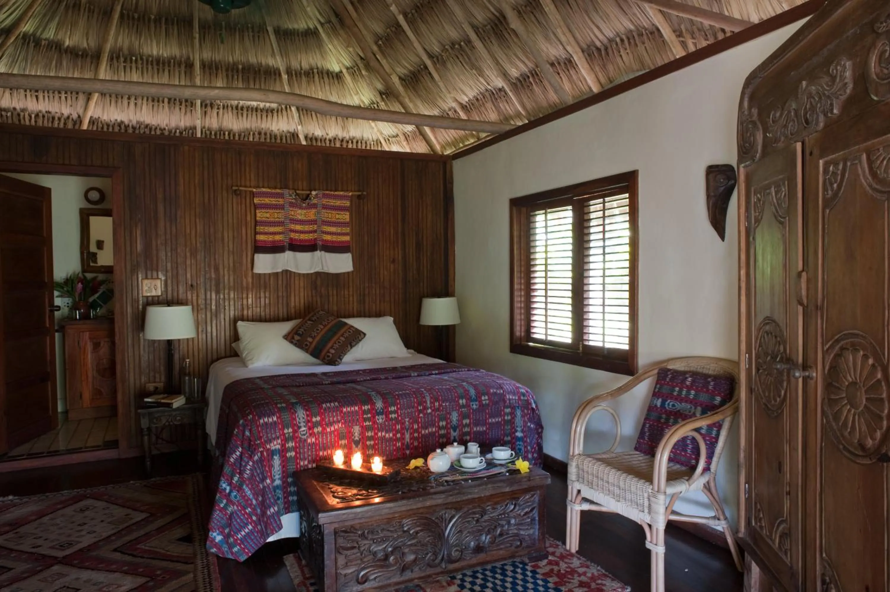 Bathroom, Bed in Blancaneaux Lodge by Francis Ford Coppola