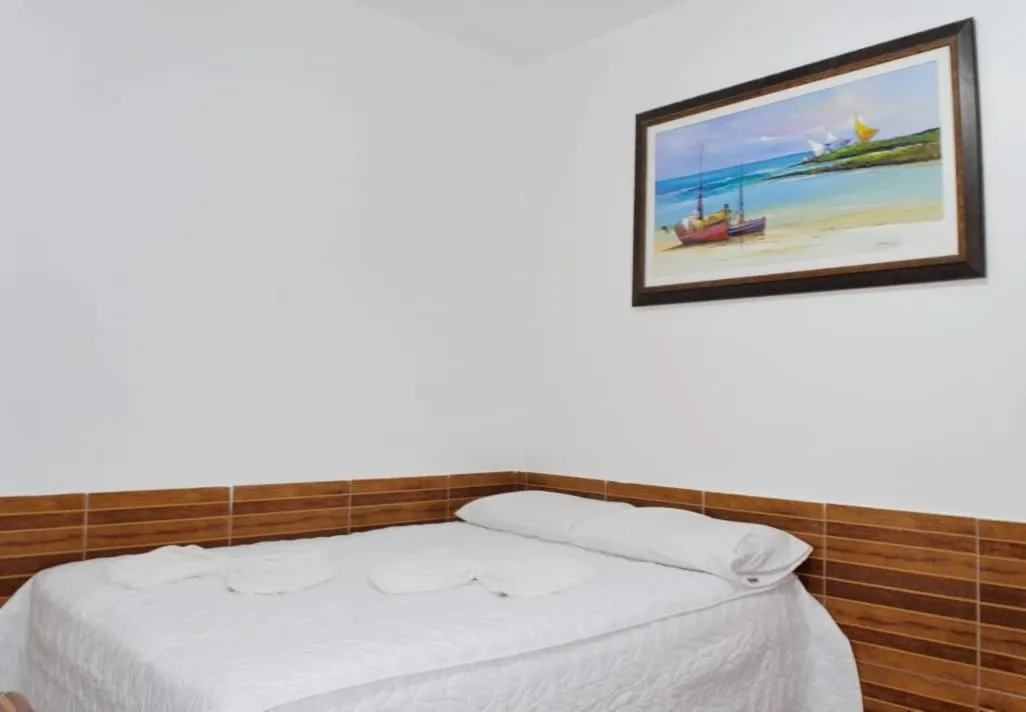 Bed in Pousada Recanto do Amanhecer