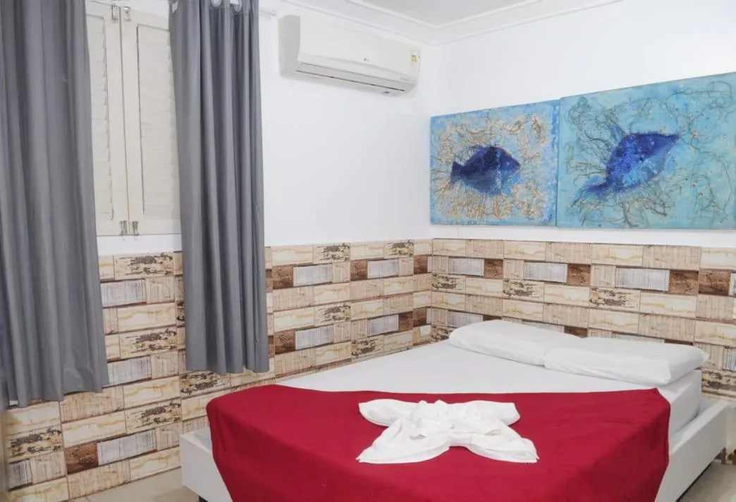 Bed in Pousada Recanto do Amanhecer