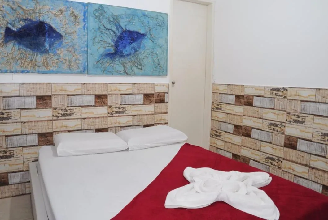 Bed in Pousada Recanto do Amanhecer