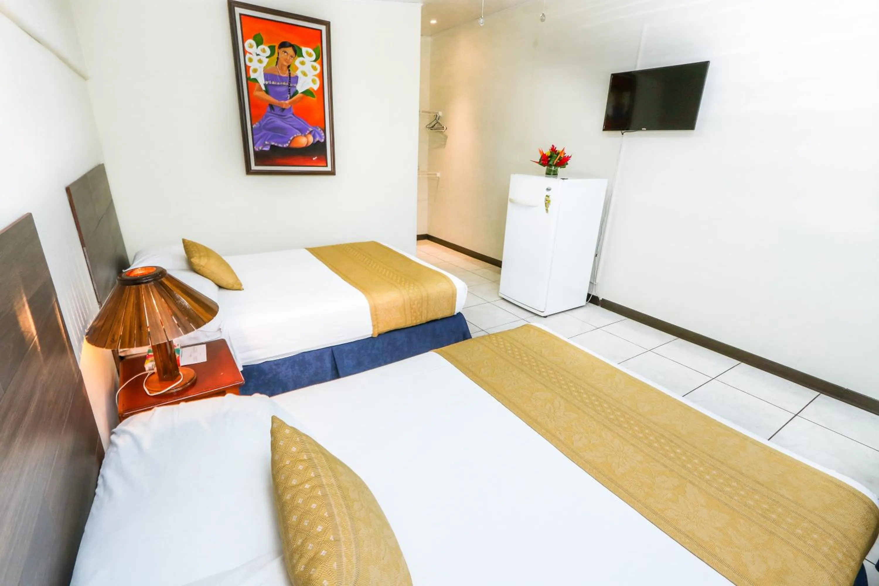 TV and multimedia, Bed in Hotel Flor Blanca