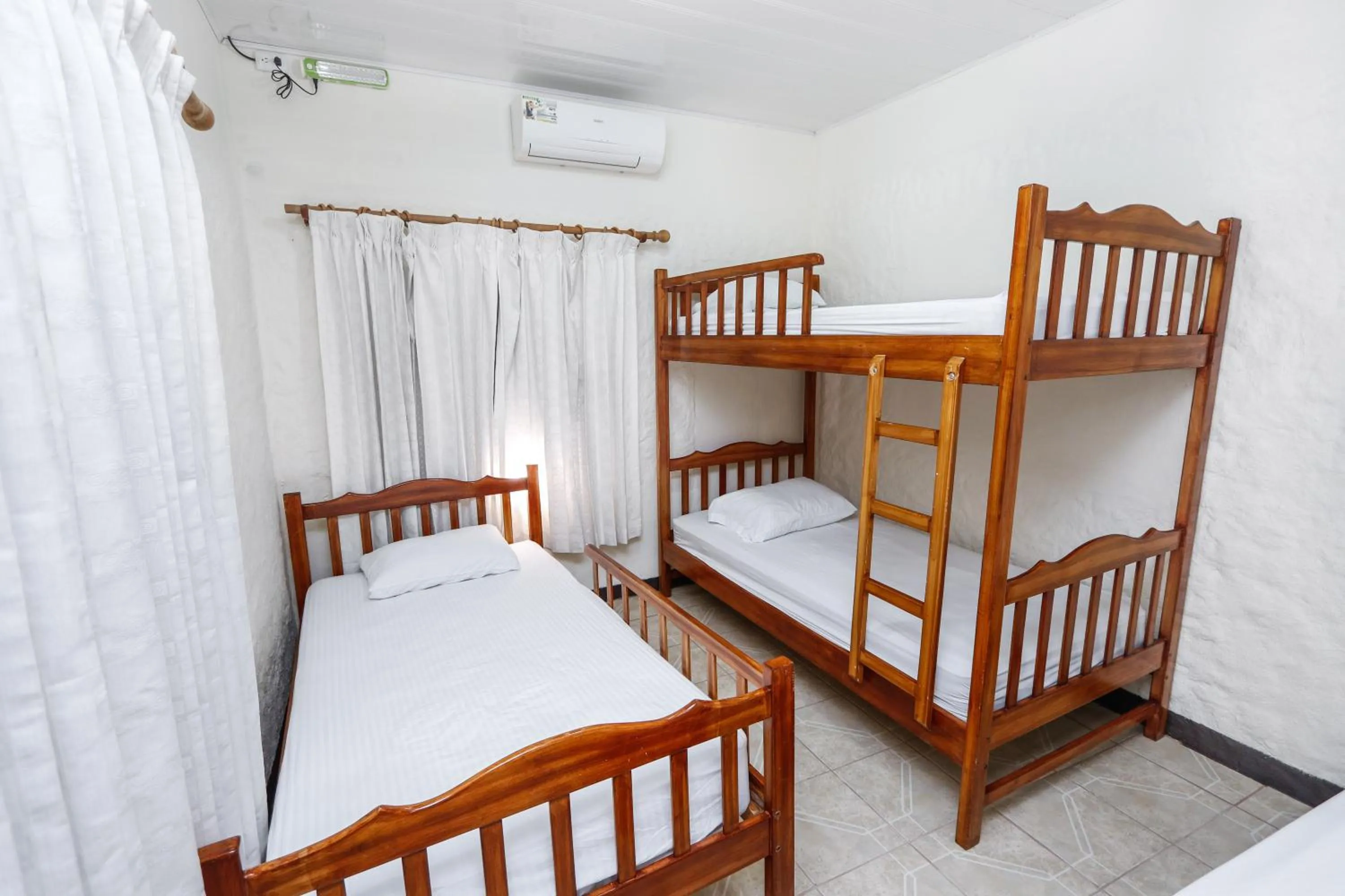 Bed in Hotel Flor Blanca