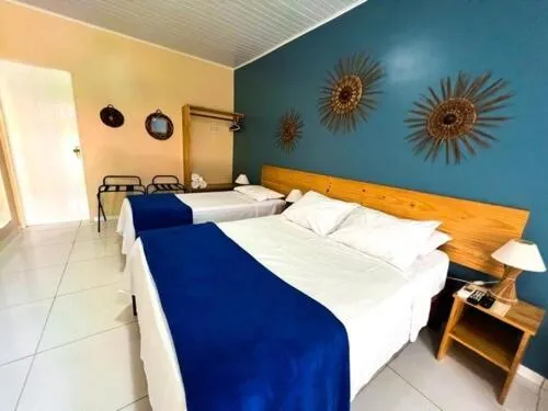 Bed in Pousada Maresia