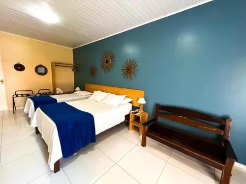 Bed in Pousada Maresia