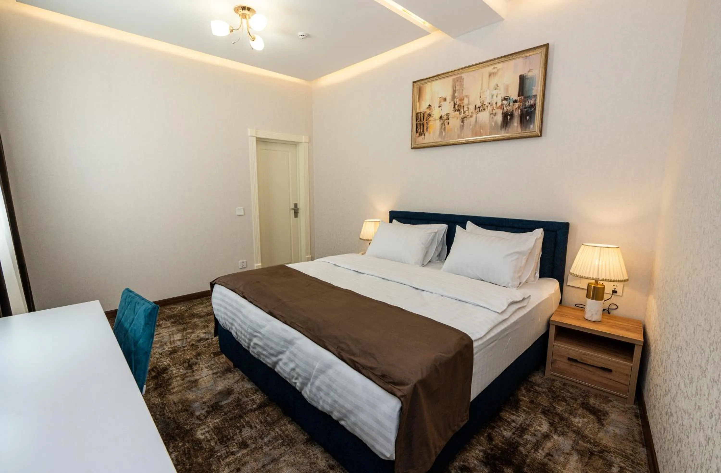 Bed in Garnet Mir Hotel