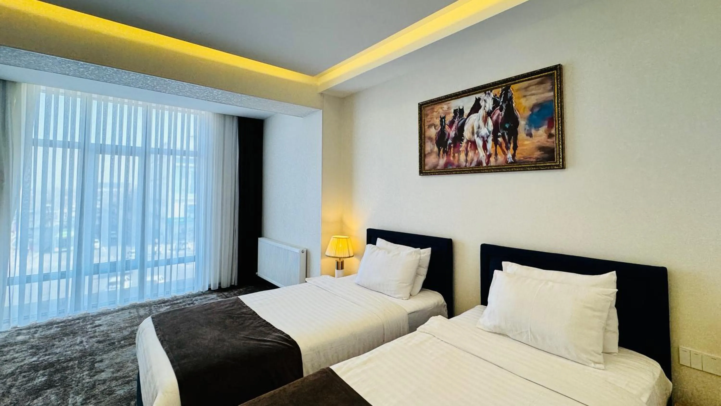 Bed in Garnet Mir Hotel