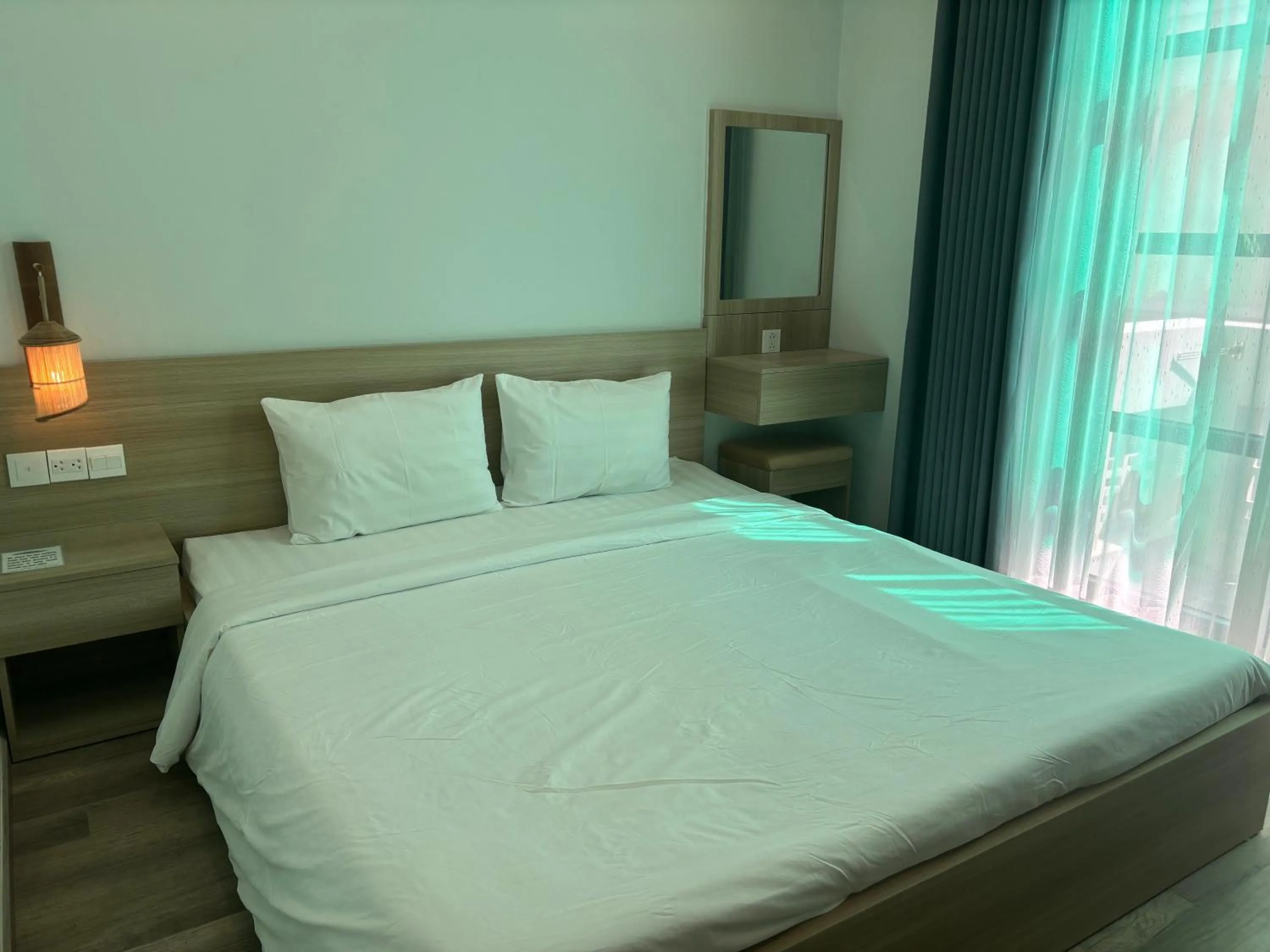 Bed in Green Inn Phu Quoc Hotel