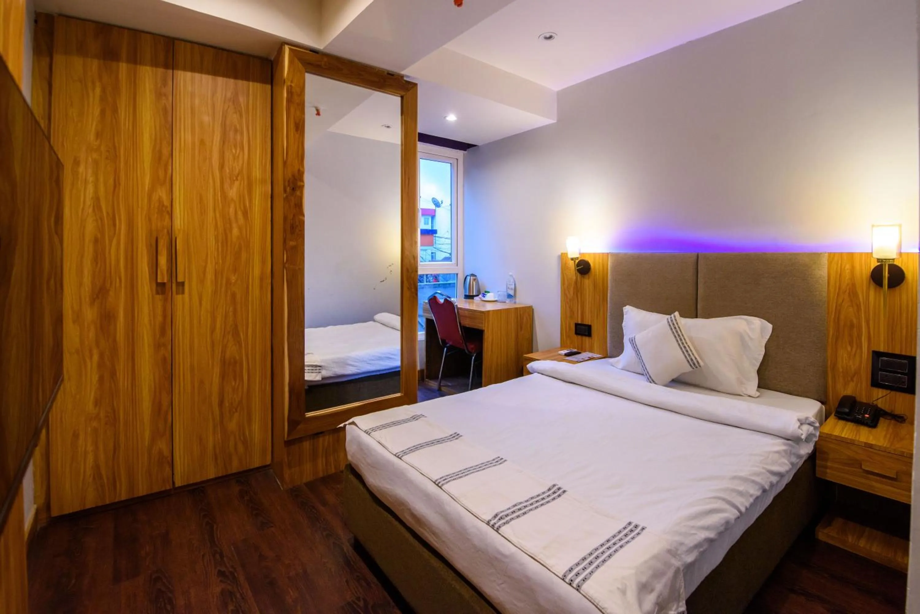 Bed in Emerald Hotel