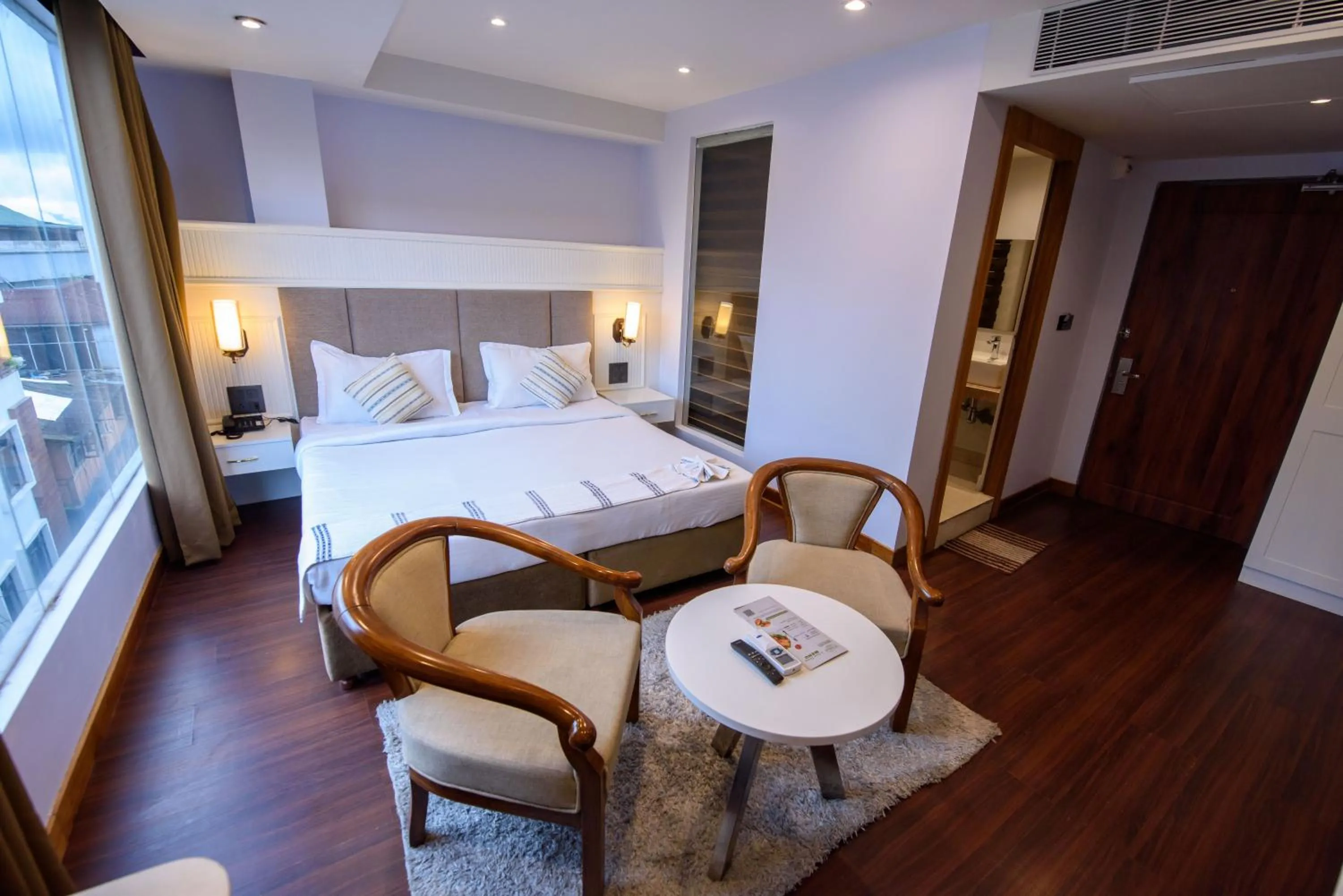 Bedroom, Bed in Emerald Hotel