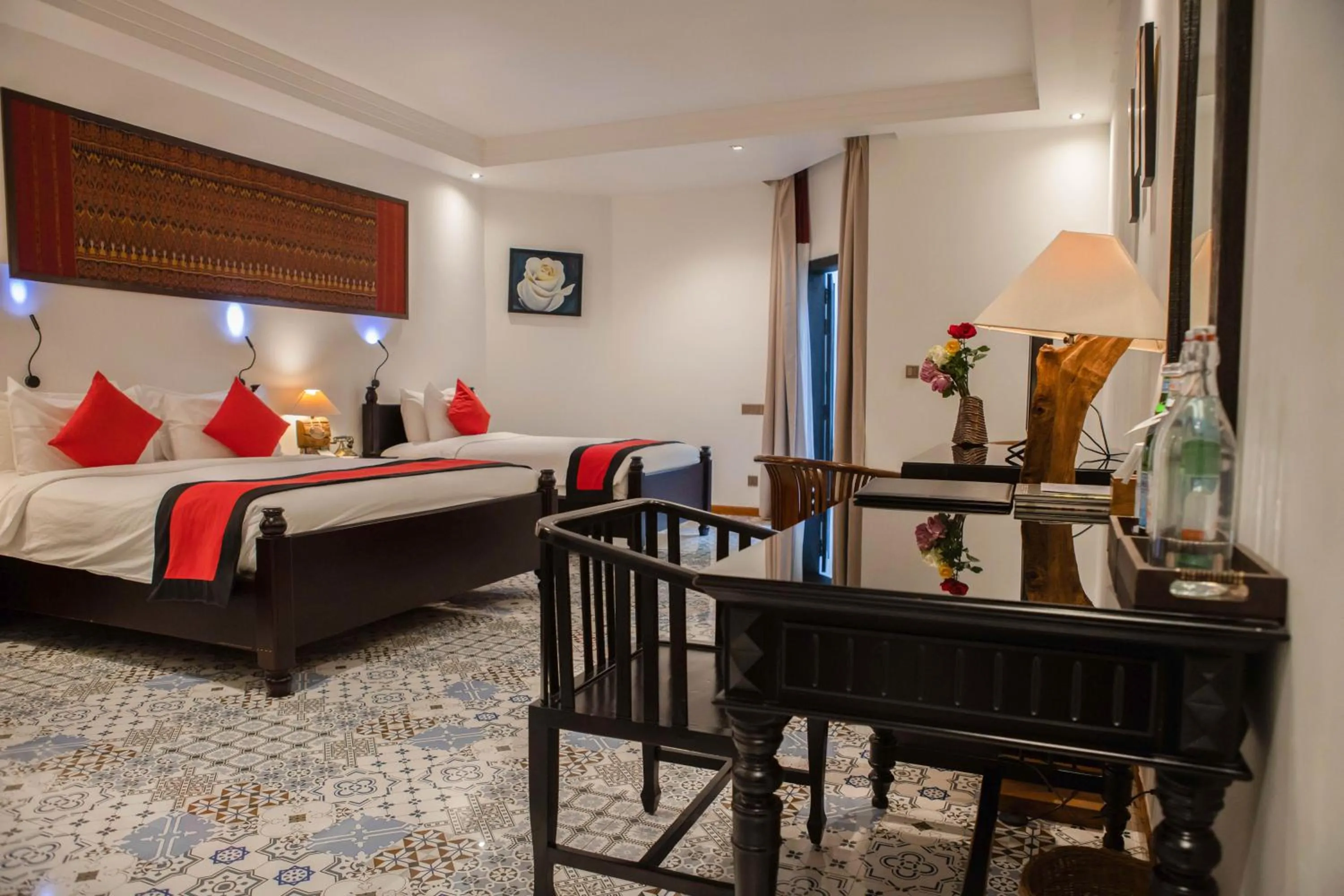 Bed in La Rose Suites