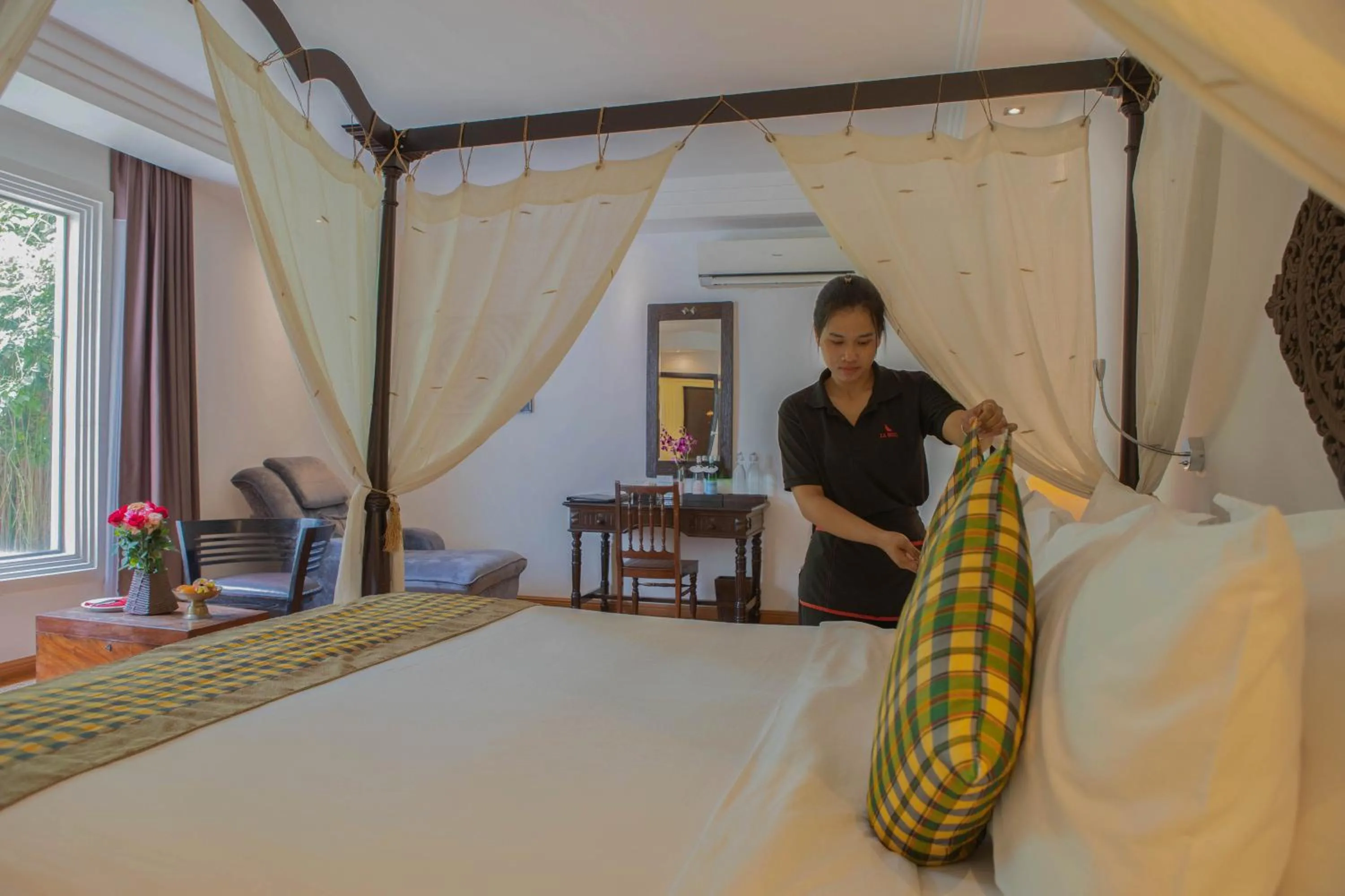 Bed in La Rose Suites