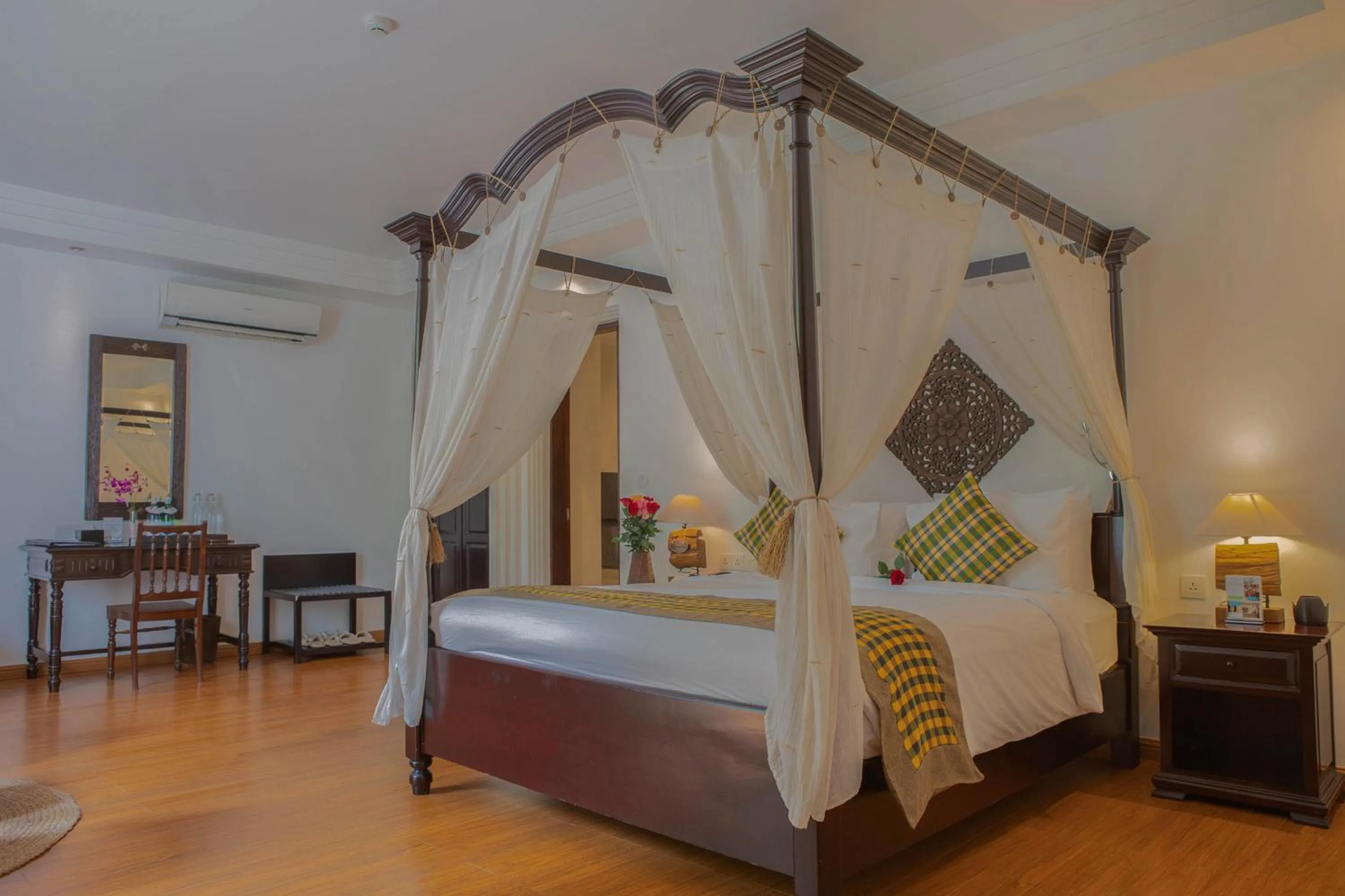 Bed in La Rose Suites