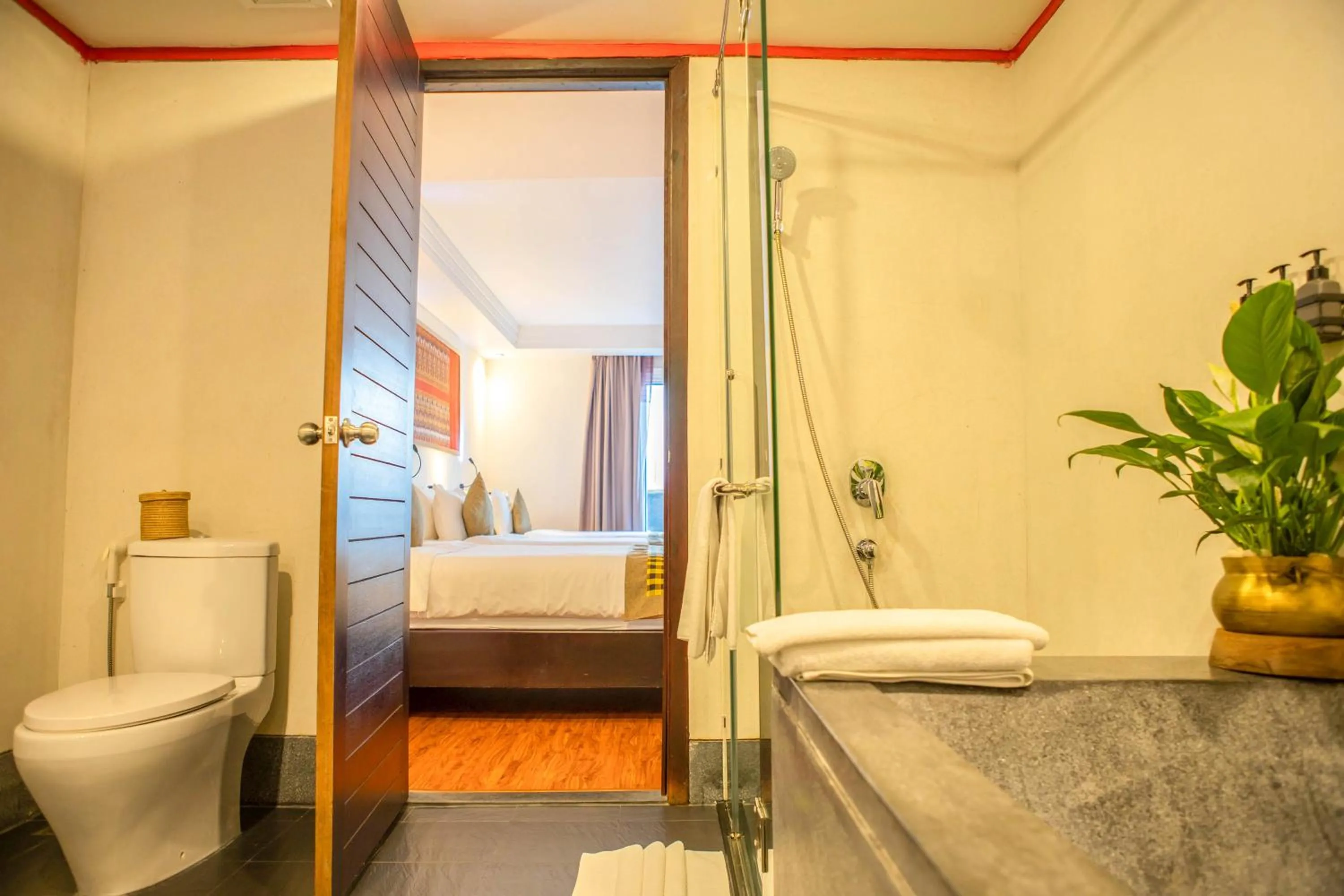 Bed in La Rose Suites