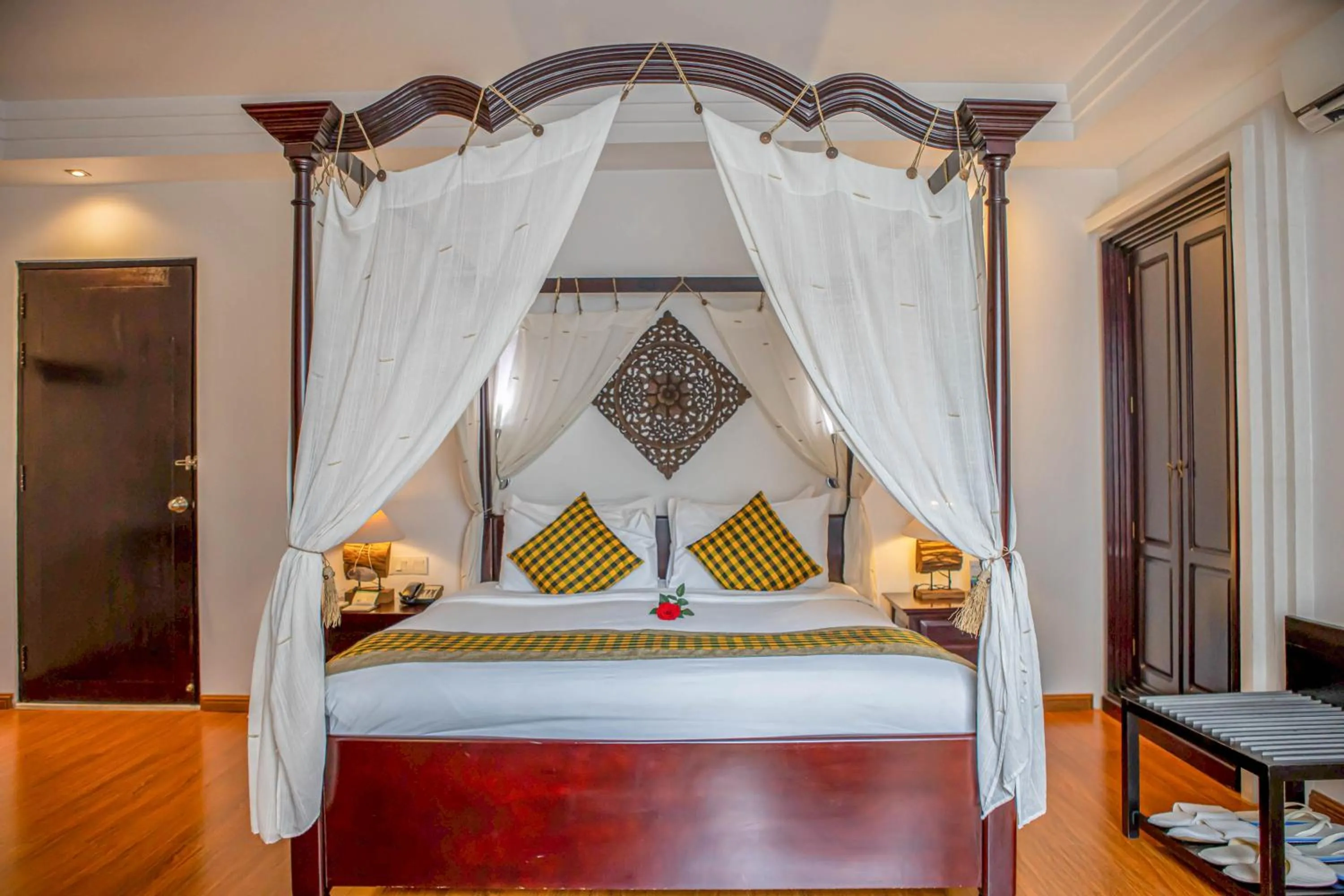 Bed in La Rose Suites