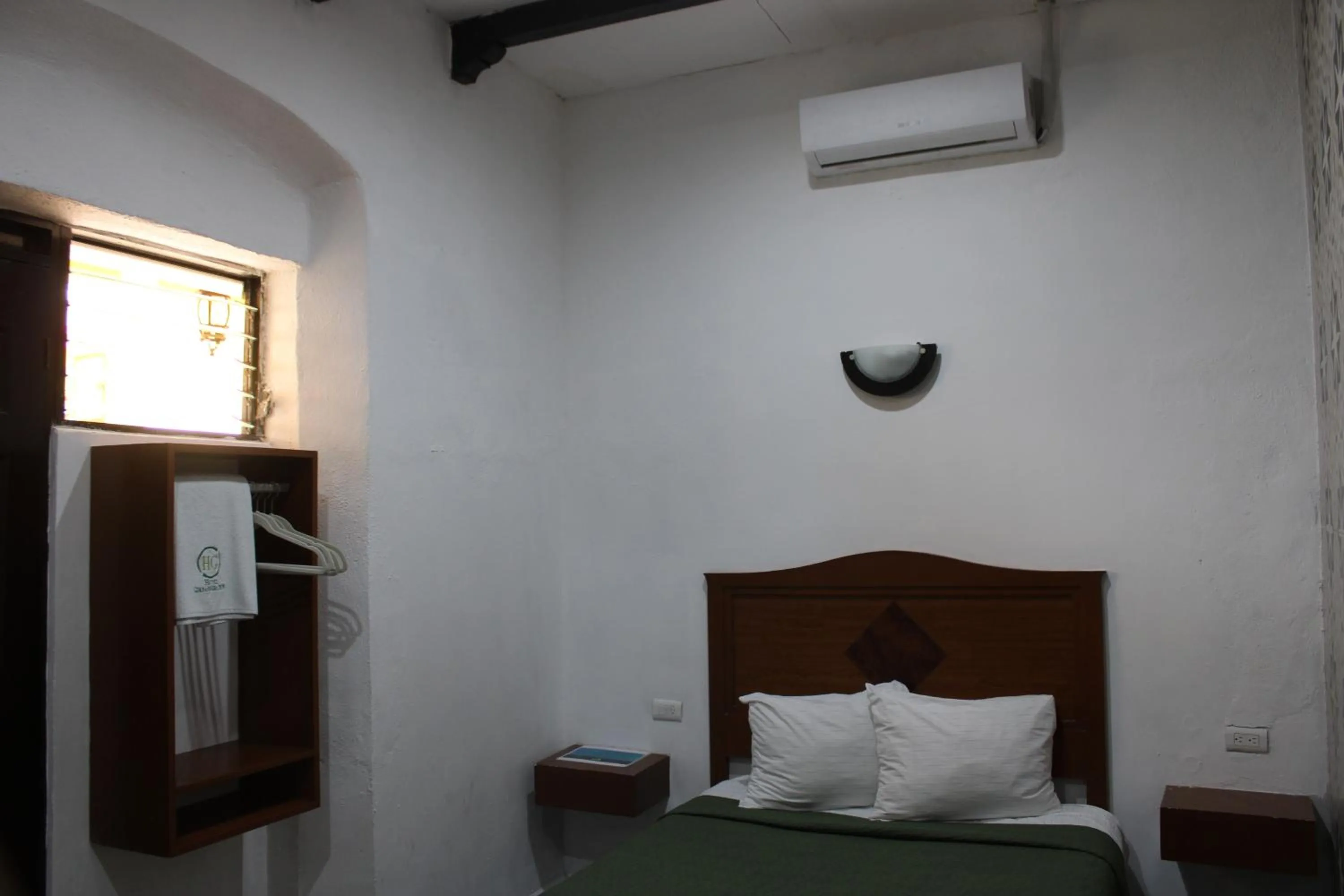 Bed in Hotel Guaranducha Inn