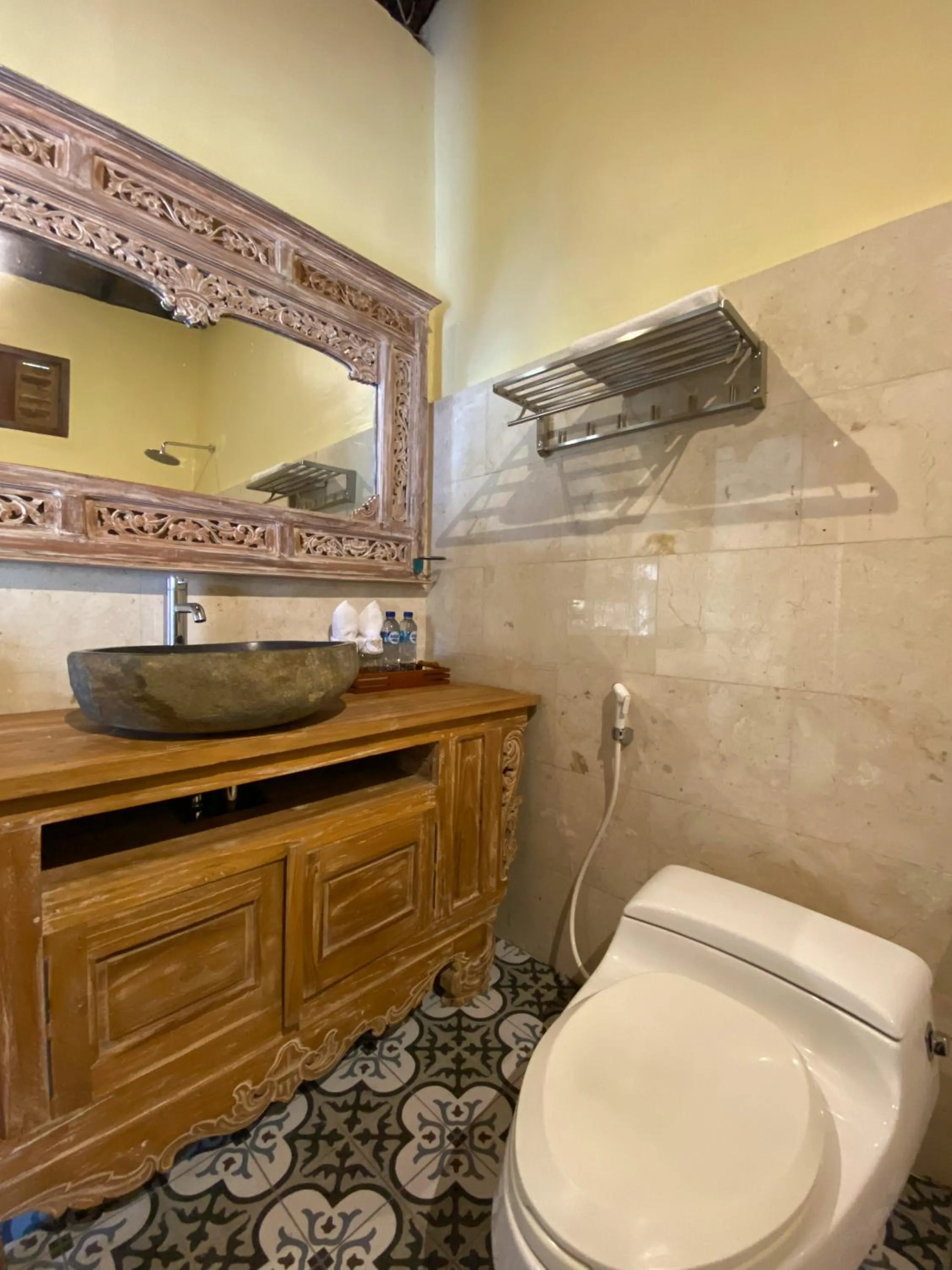 Toilet in Uma Linggah Resort by Puri Signatures