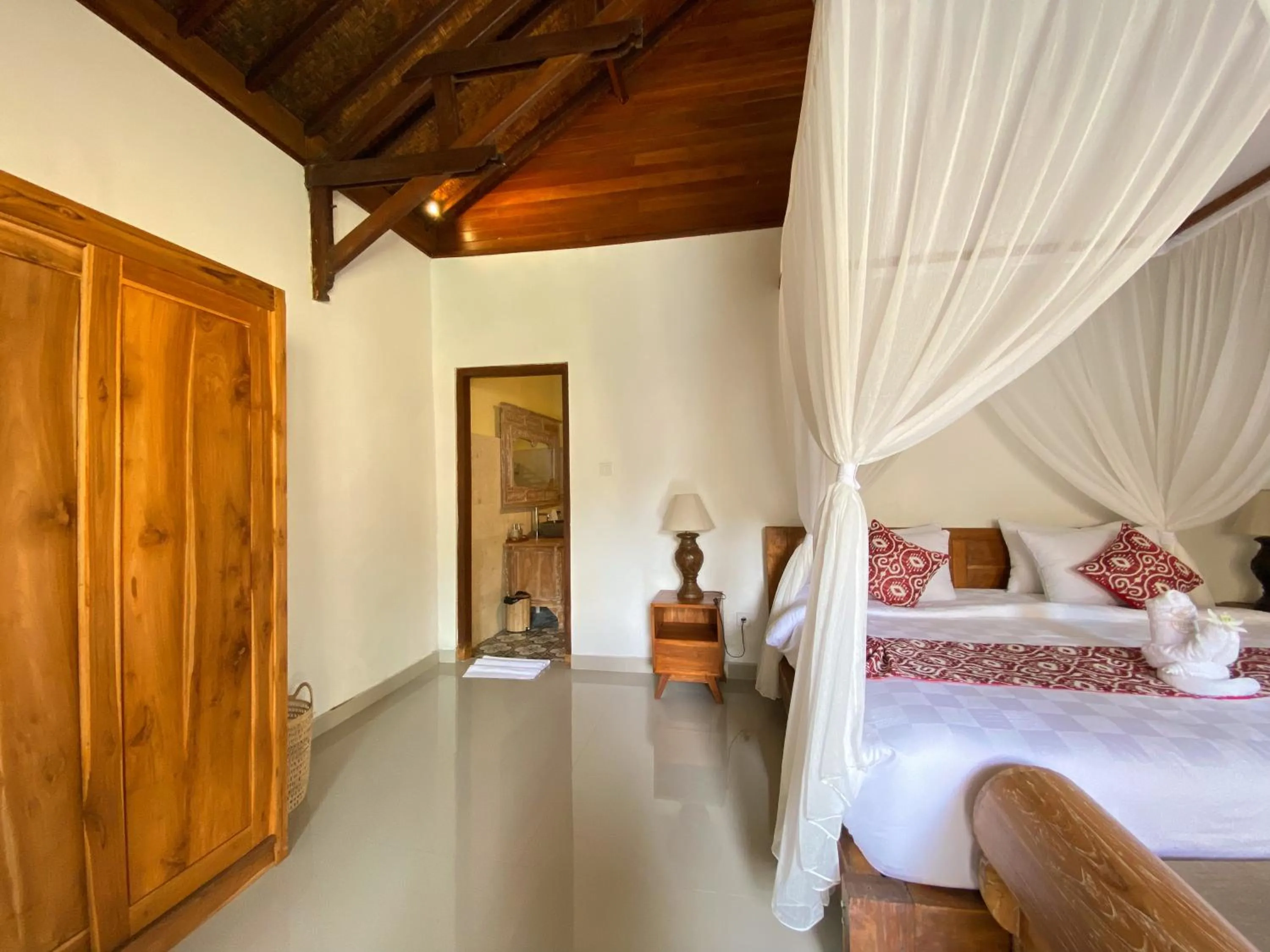 Bed in Uma Linggah Resort by Puri Signatures