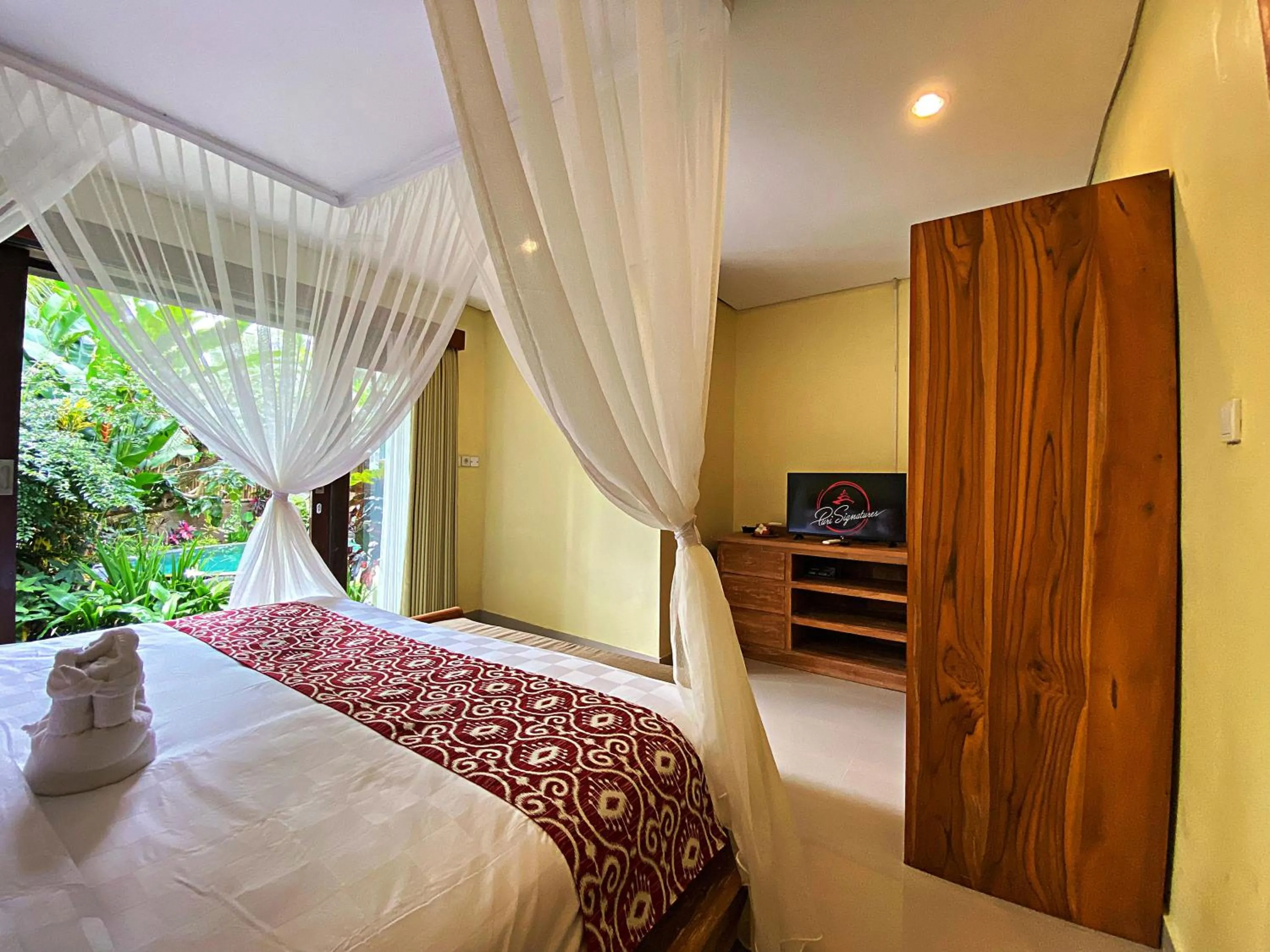 Bed in Uma Linggah Resort by Puri Signatures