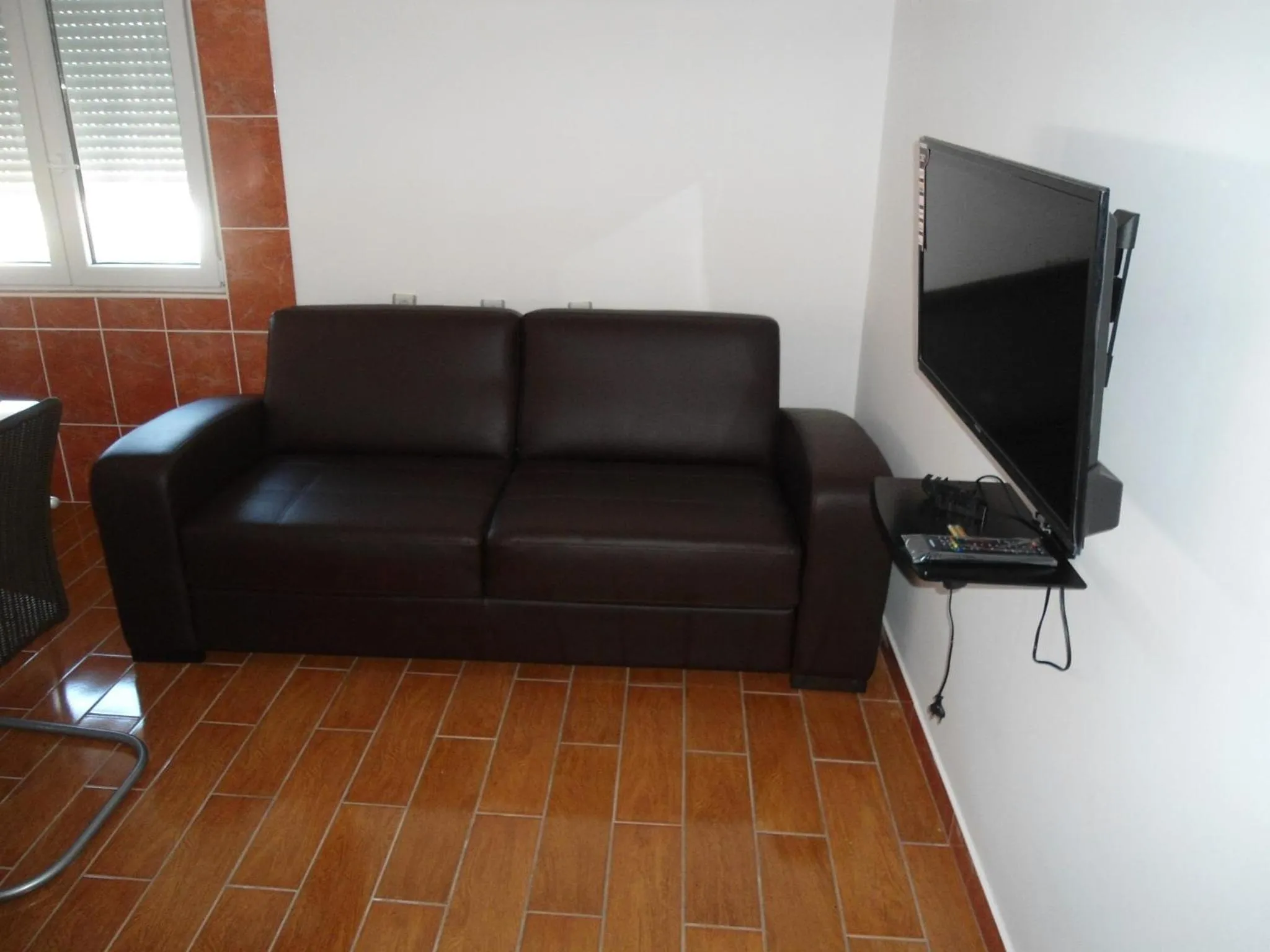 Communal lounge/ TV room in Lazar Apartments