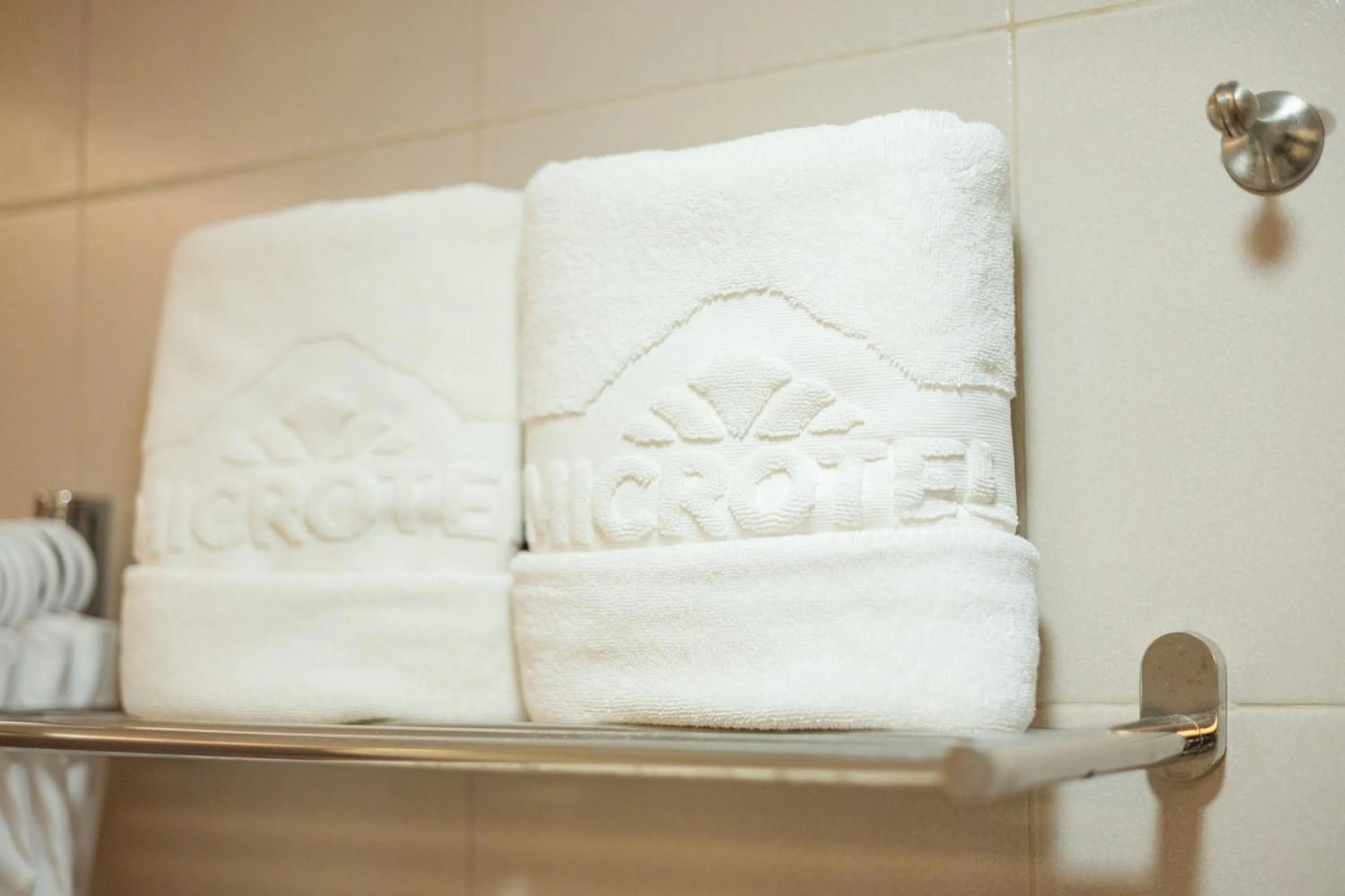 towels, Bed in Microtel by Wyndham South Forbes near Nuvali