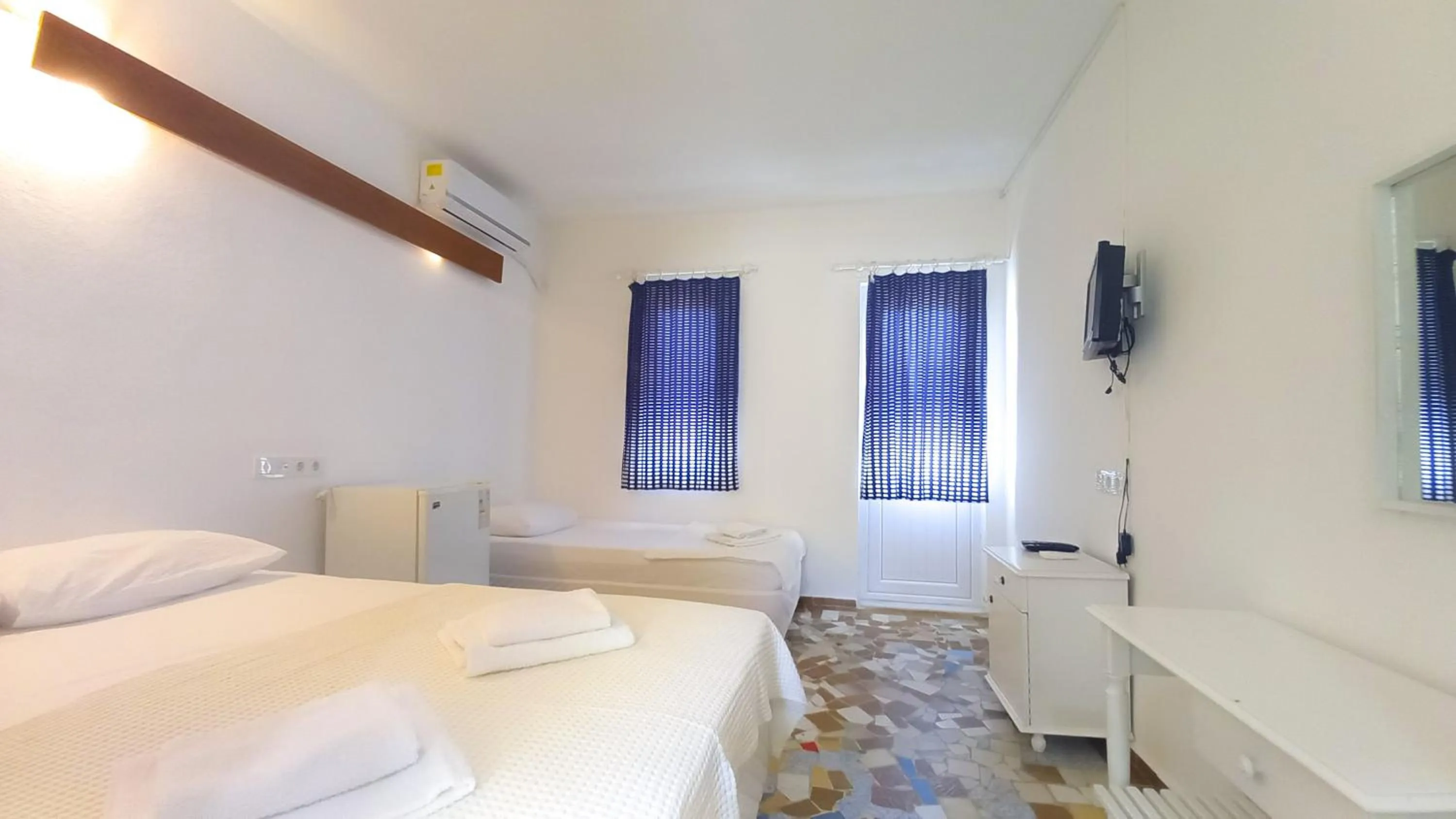 Bed in Hotel Tropicana