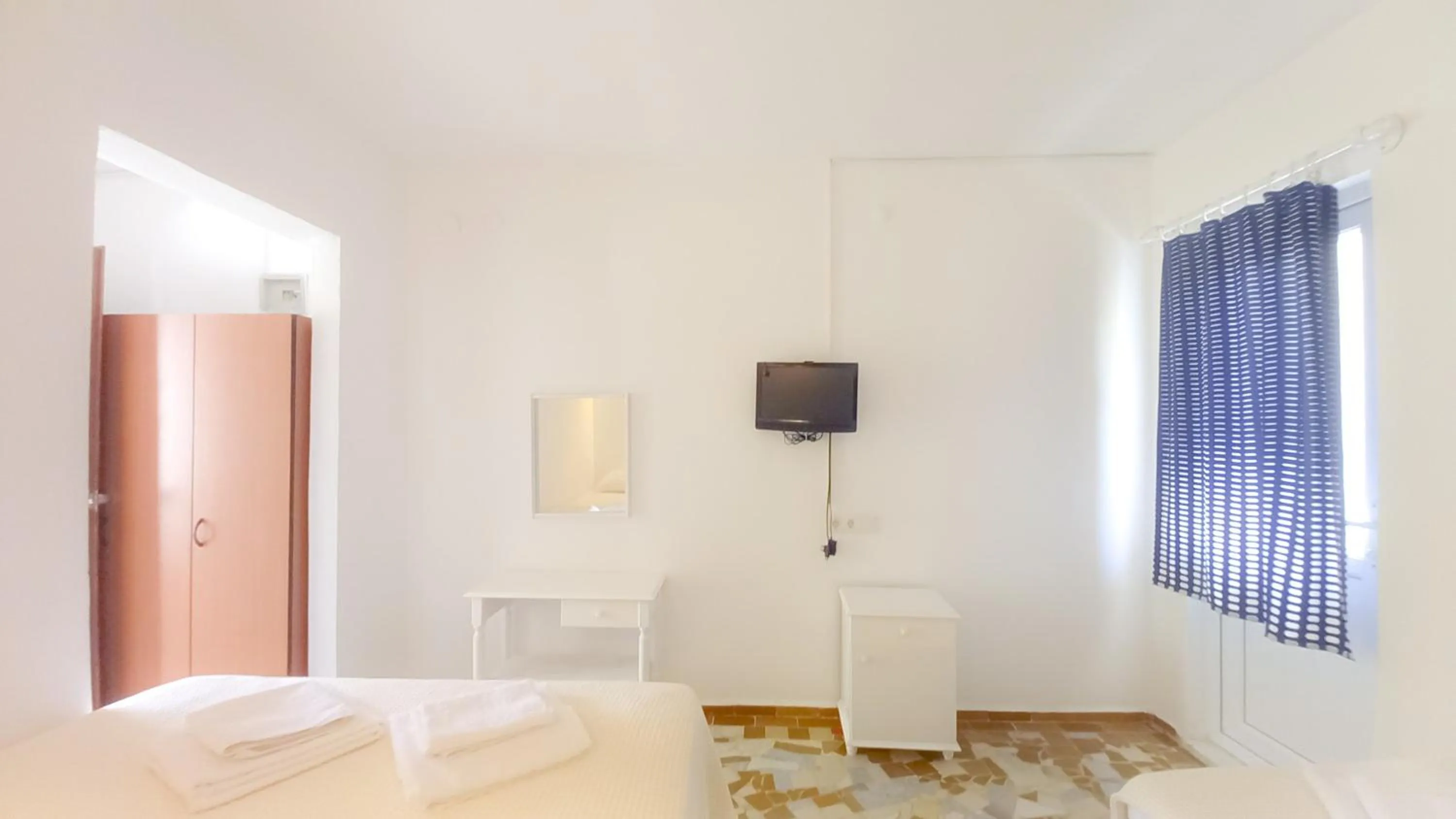 Bed in Hotel Tropicana