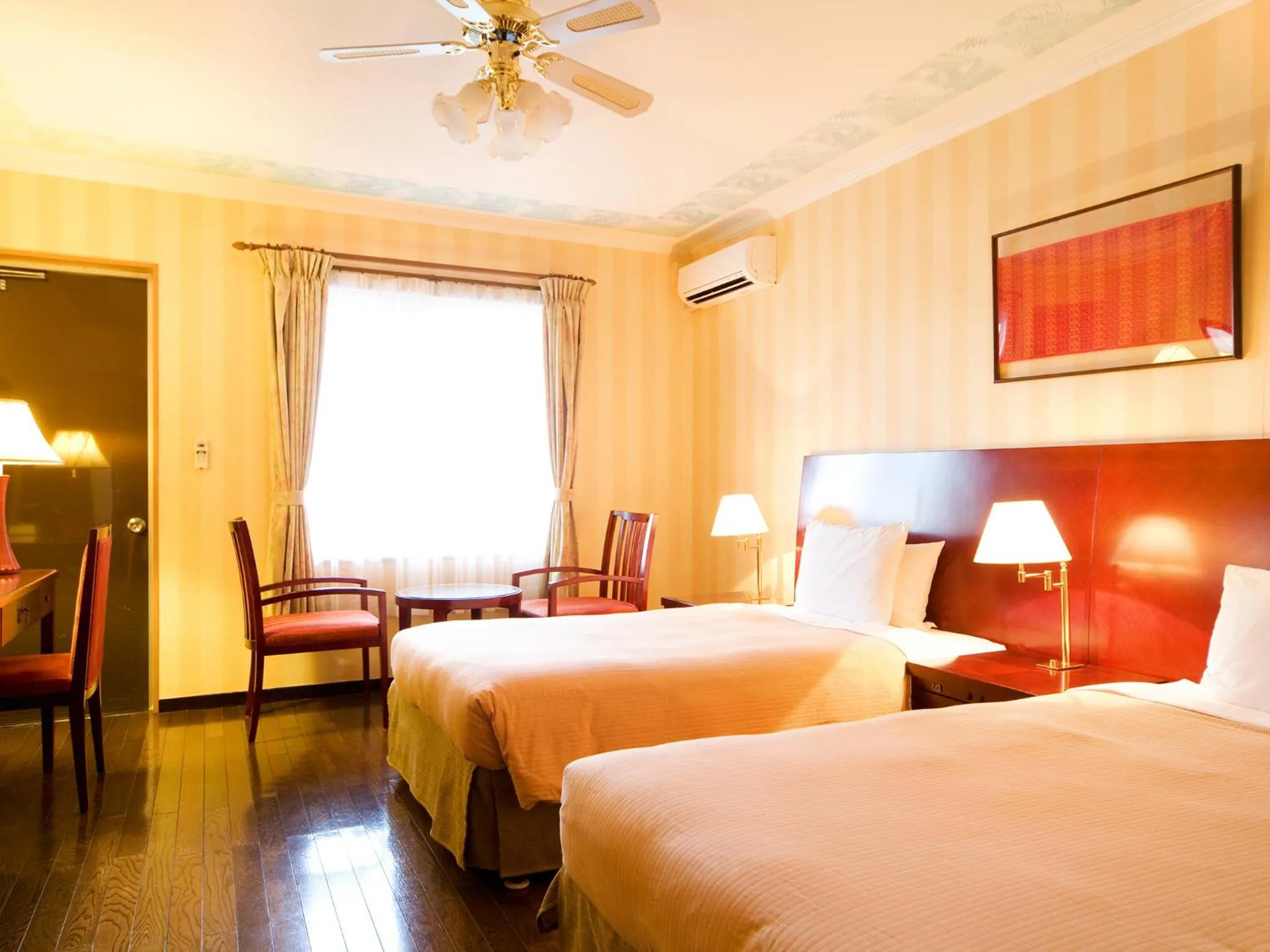 Photo of the whole room, Bed in Coco Garden Resort Okinawa