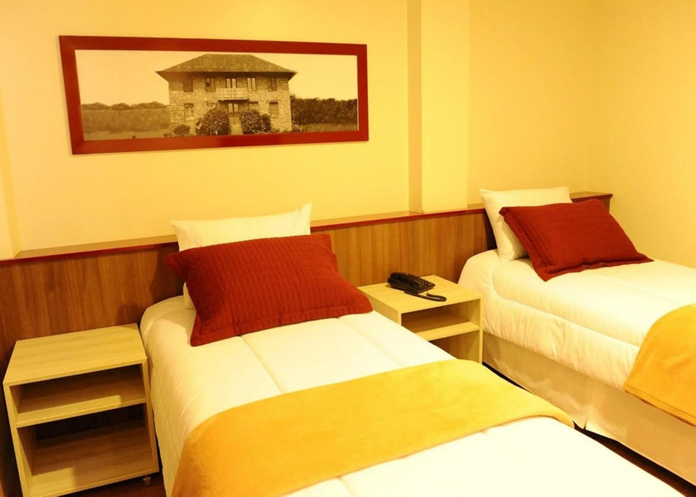 Photo of the whole room in Imigrantes Hotel