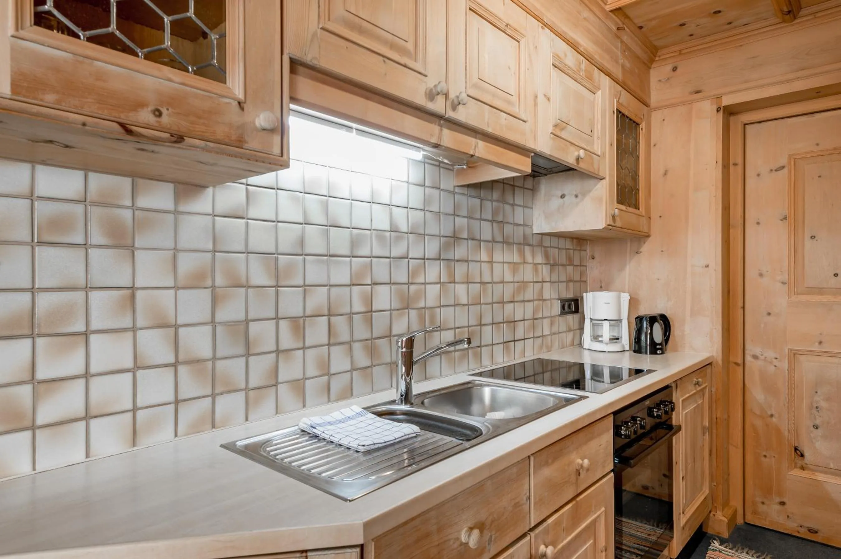 Kitchen or kitchenette in Apart Hotel Garni Wieser