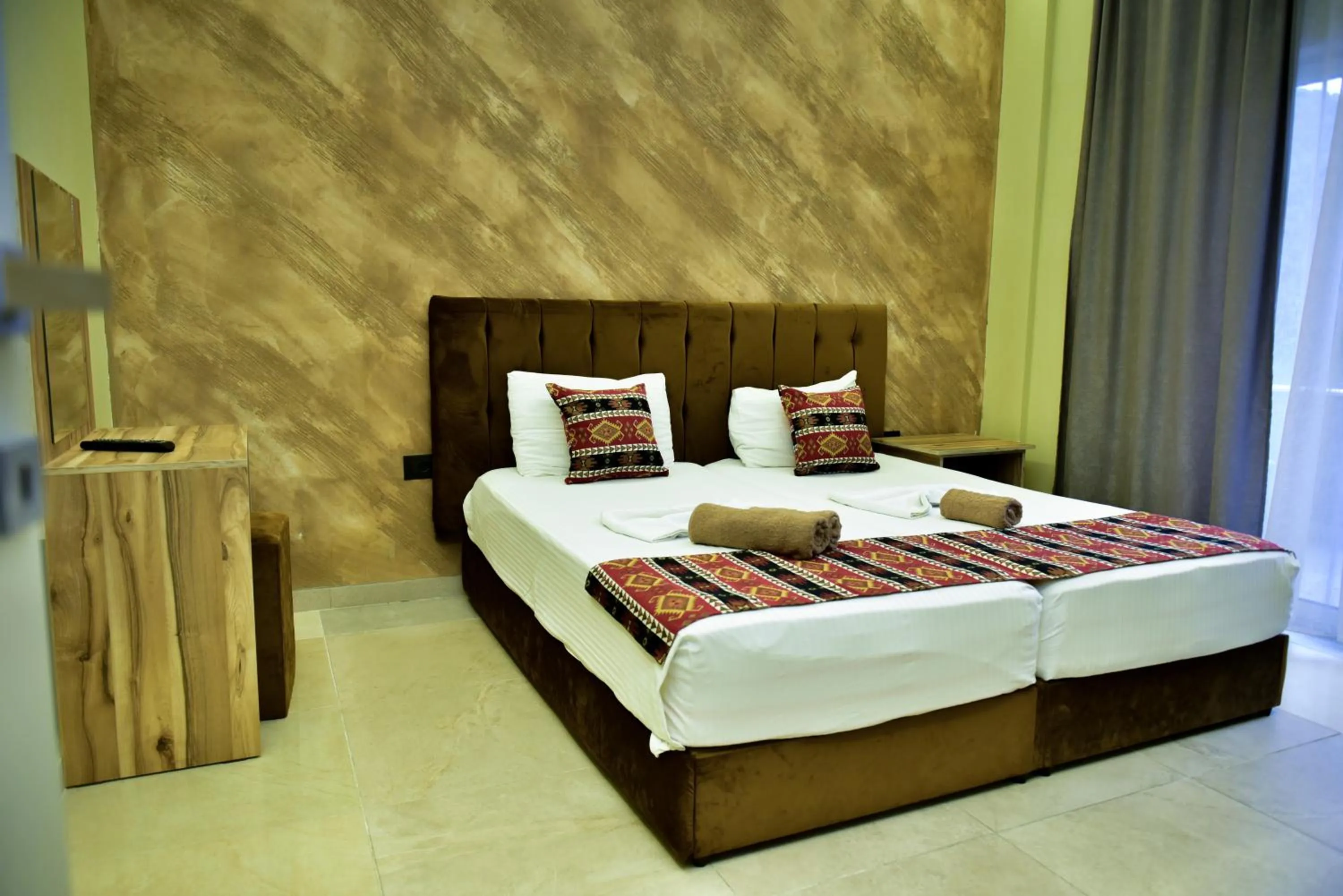 Bed in TE BUJTINA HOTEL- Cozy Stay with Traditional Breakfast Near Beach