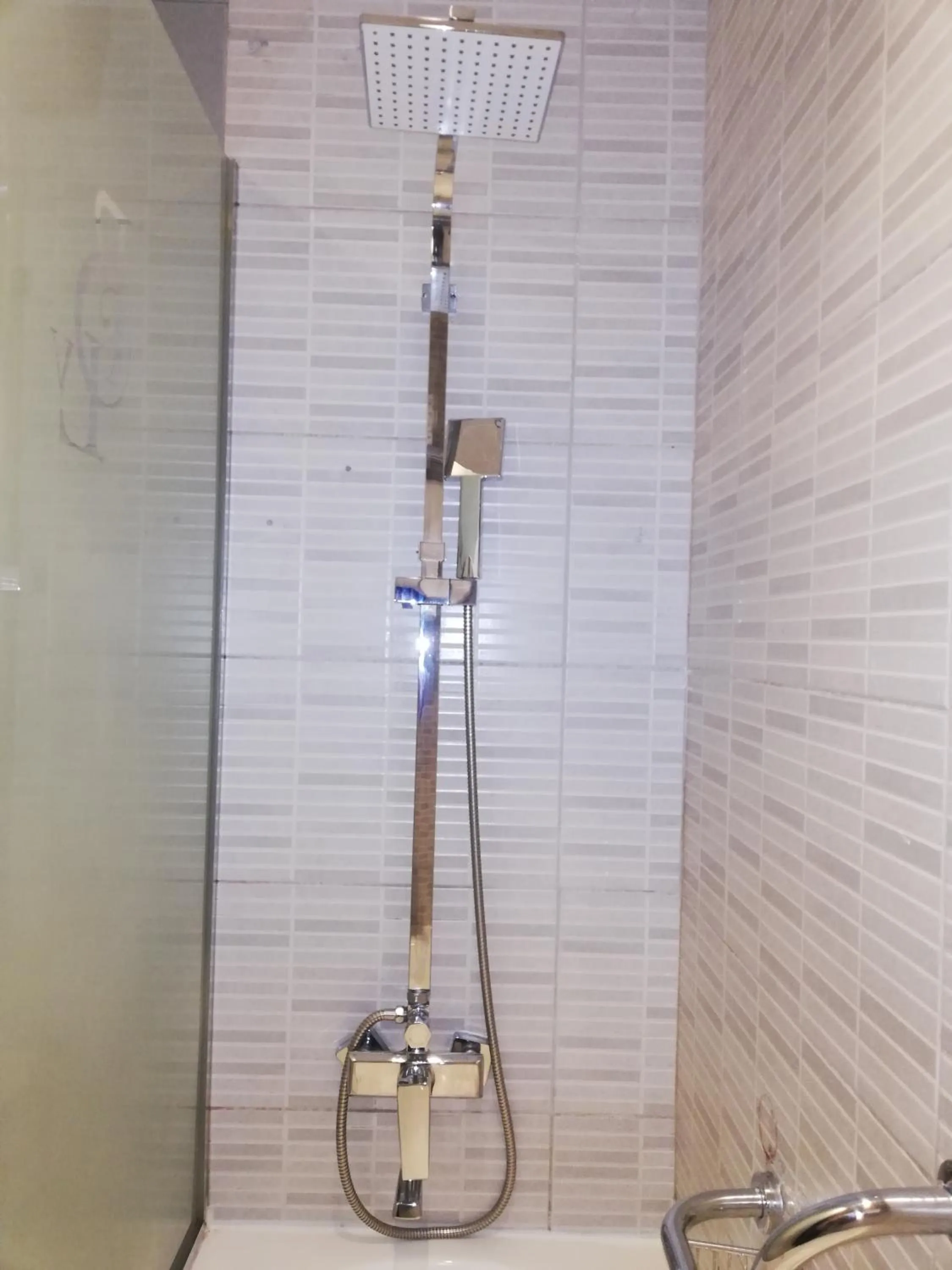 Shower in Boulevard City Suites Hotel Apartments