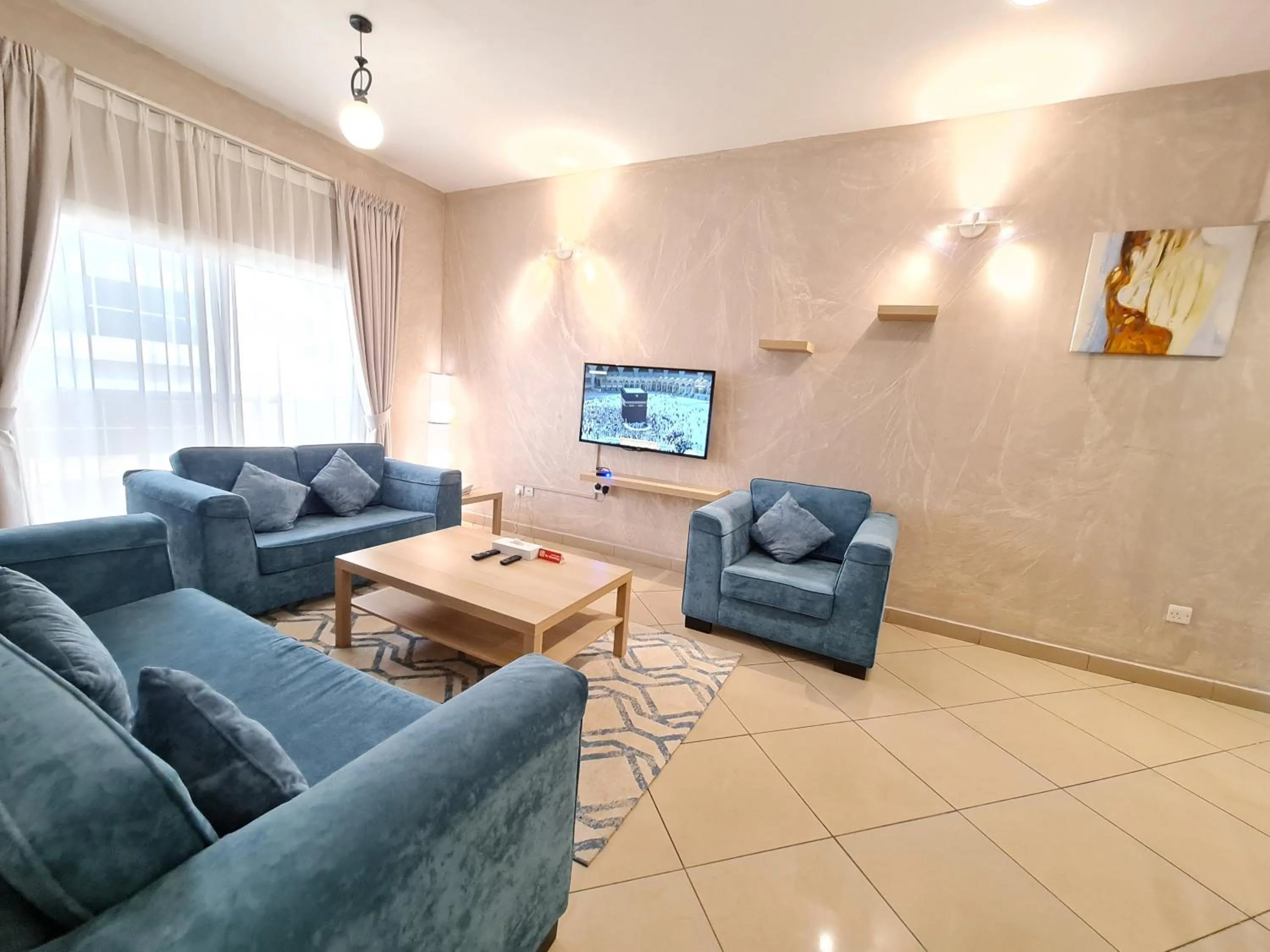 TV and multimedia in Boulevard City Suites Hotel Apartments