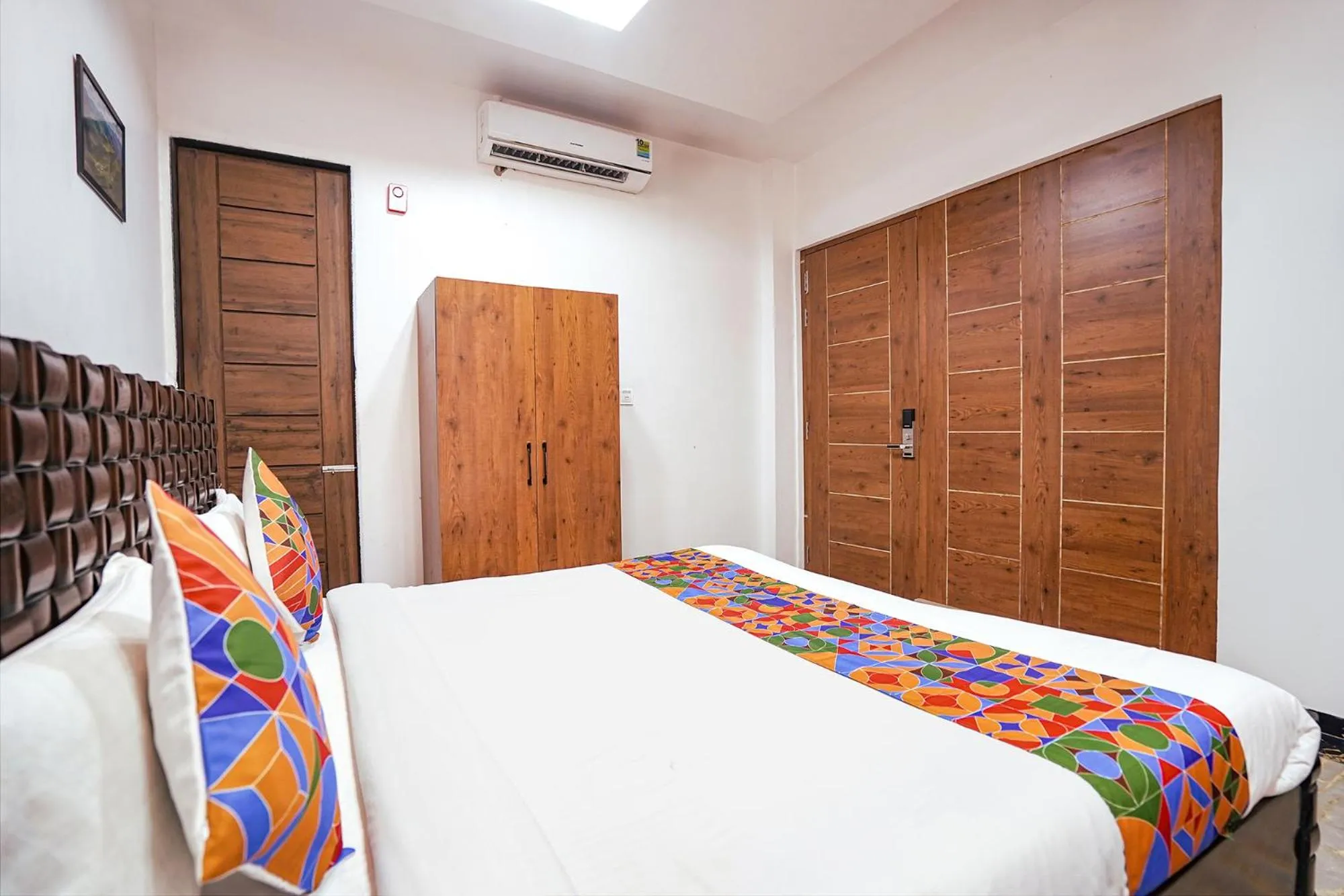 Bed in FabHotel Villa De Benares - Nr Tulsi Manas Mandir