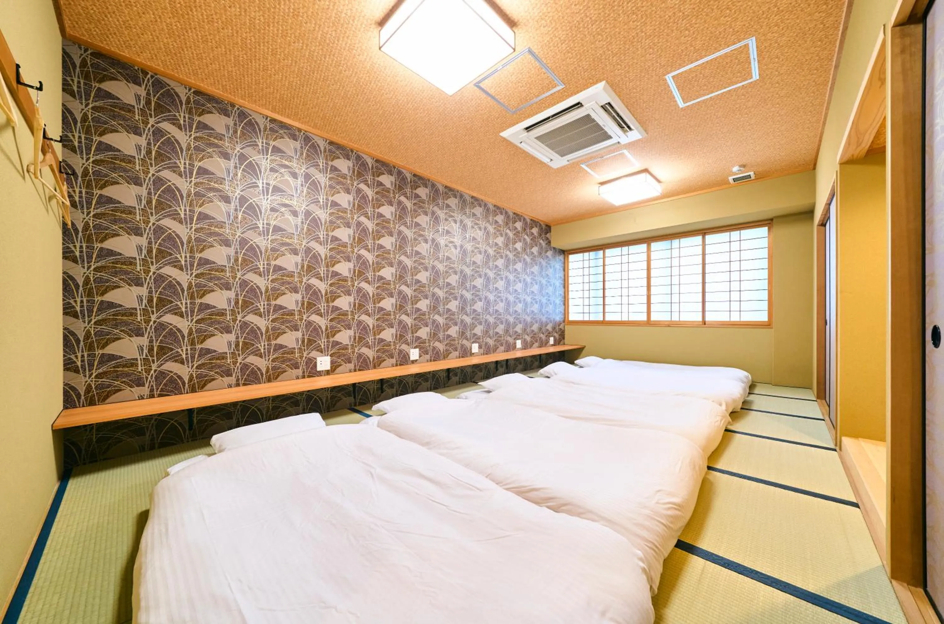 Photo of the whole room, Bed in COGO TENNOJI