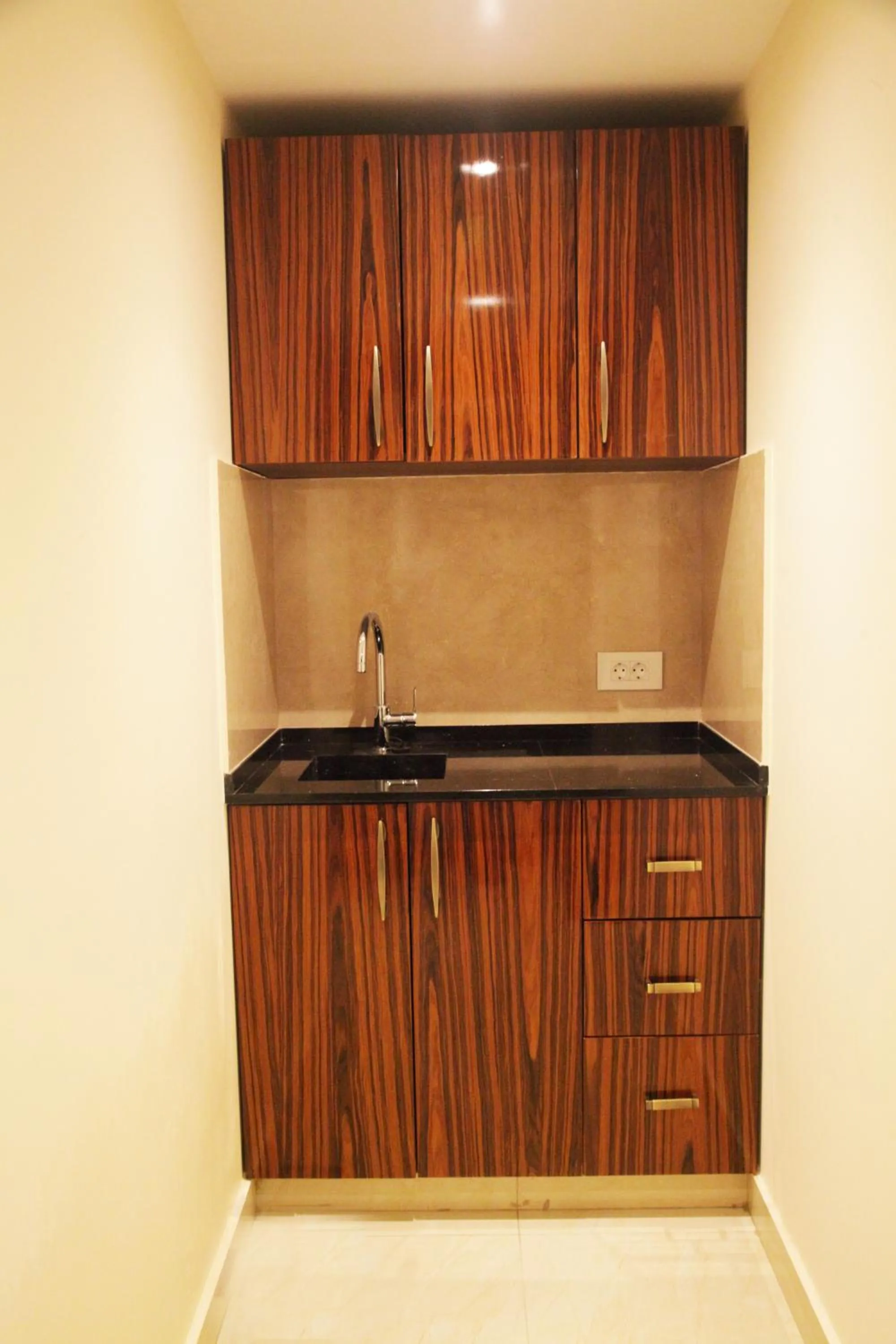 Kitchen or kitchenette in Grand Concerto Hotel