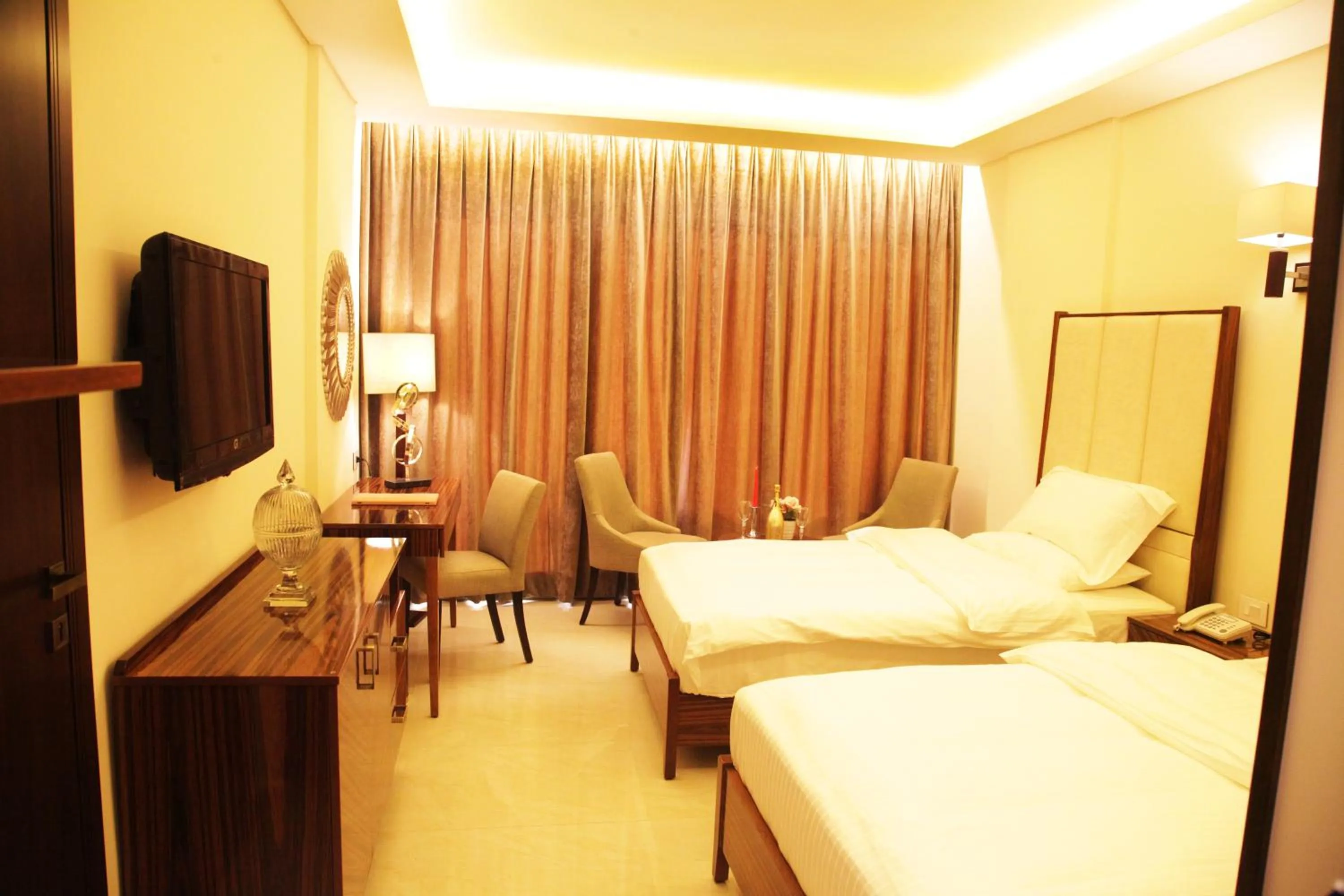 Photo of the whole room, Bed in Grand Concerto Hotel
